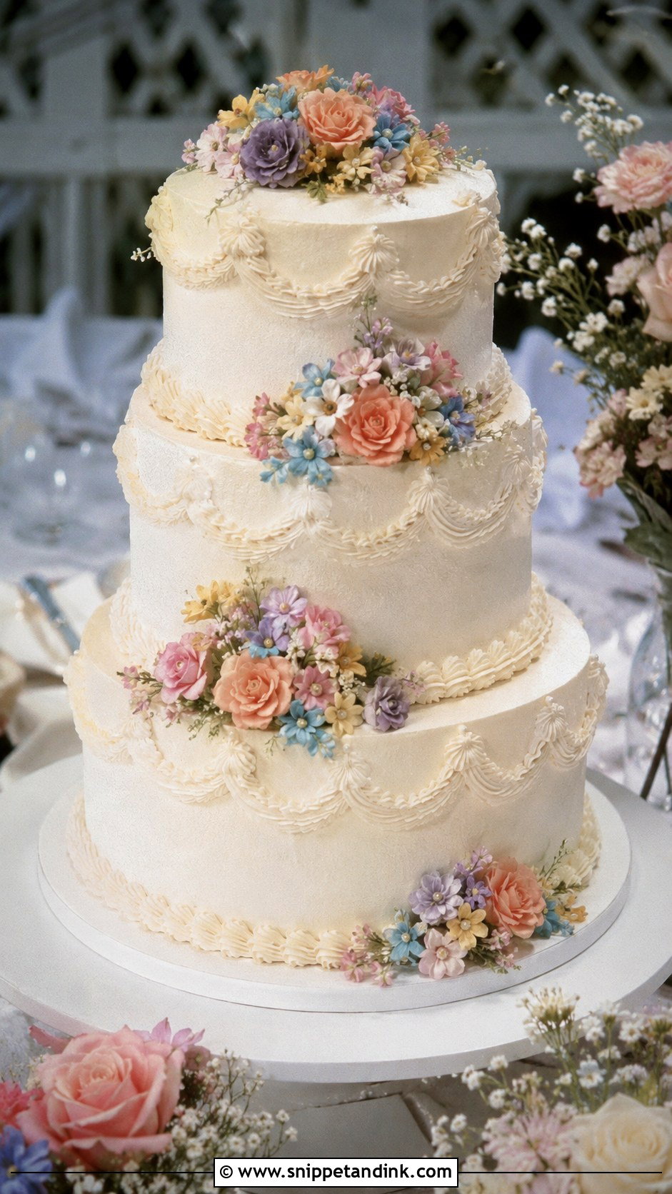 1970s Wedding Cake With Pastel Flowers - Snippet and Ink - 20 1970s Wedding Cake Ideas