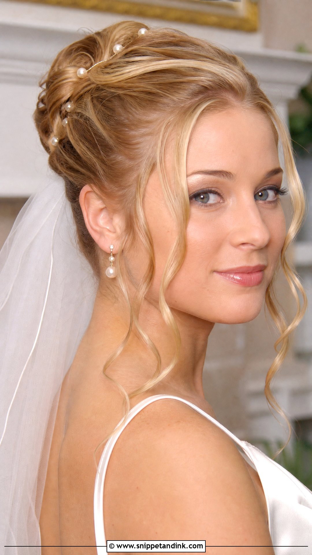 90s Bridal Updo With Tendrils - Snippet and Ink - 15 90s Wedding Hairstyles