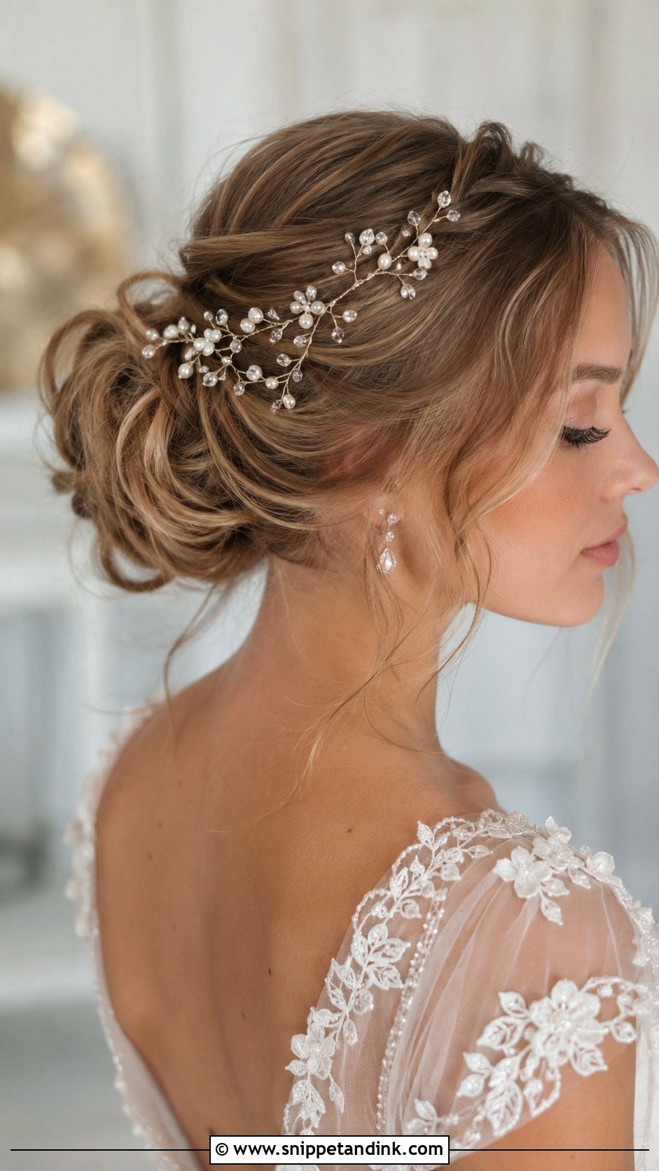 Accessorized Bridal Bun With Hair Vine - Snippet and Ink - 25 French Bride Hairstyles