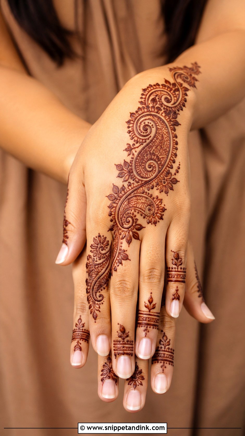 Back Hand Paisley Mehndi Design - Snippet and Ink - 35 Back Mehndi Designs