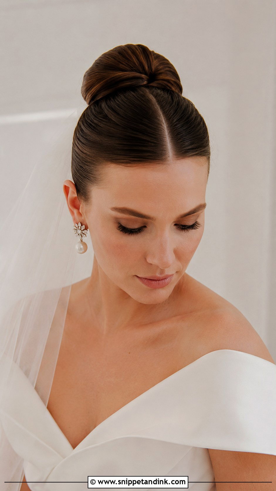 Ballerina Bun With Center Part - Snippet and Ink - 25 Classy Wedding Hair Ideas