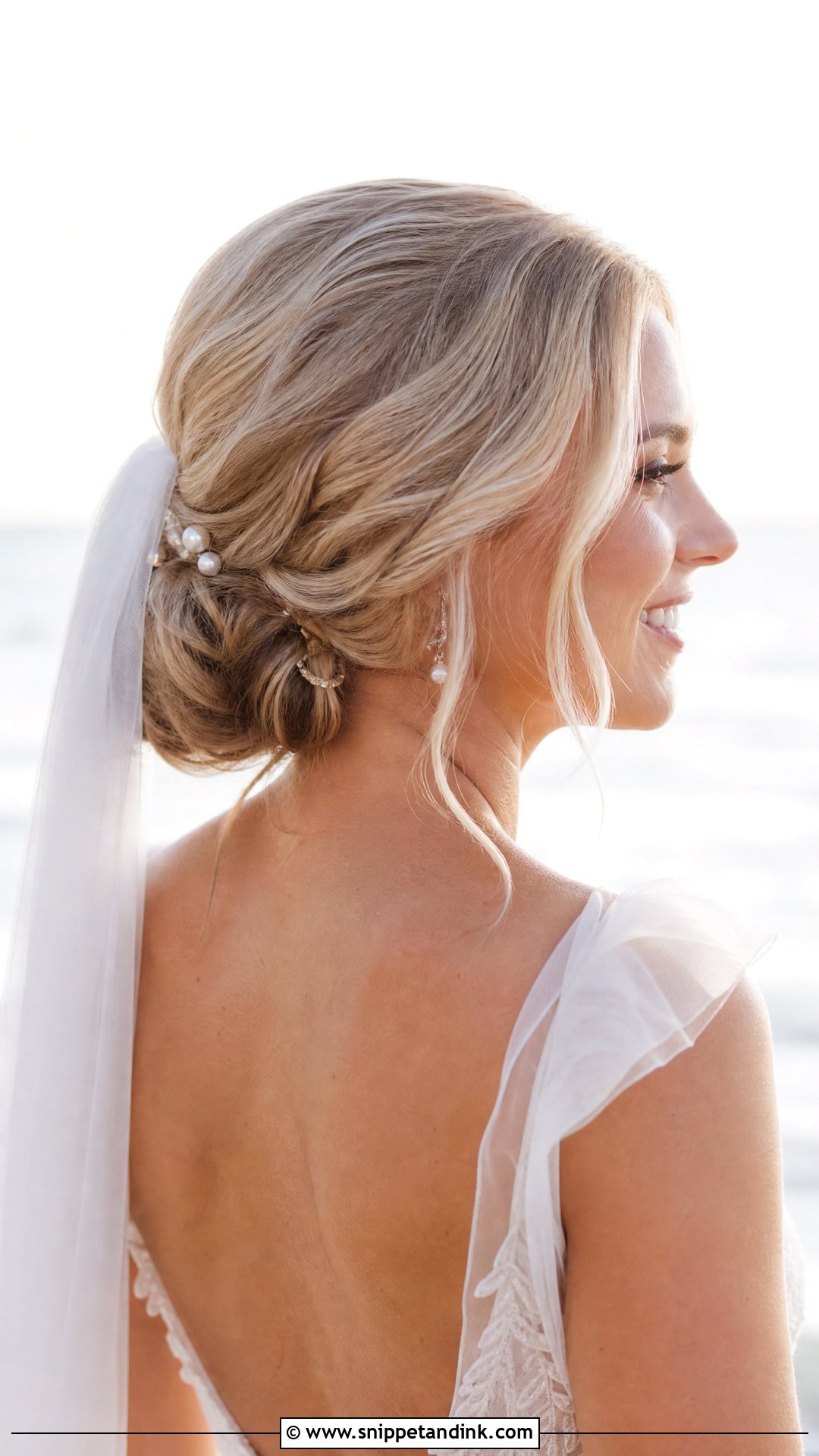 Beach Wedding Low Bun - Snippet and Ink - 15 Bridal Hair Beach Wedding Ideas