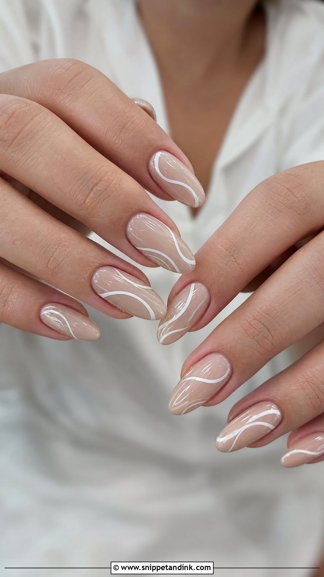 Beige Nails With White Swirls - Snippet and Ink - 25 Wedding Guest Nail Inspo Ideas