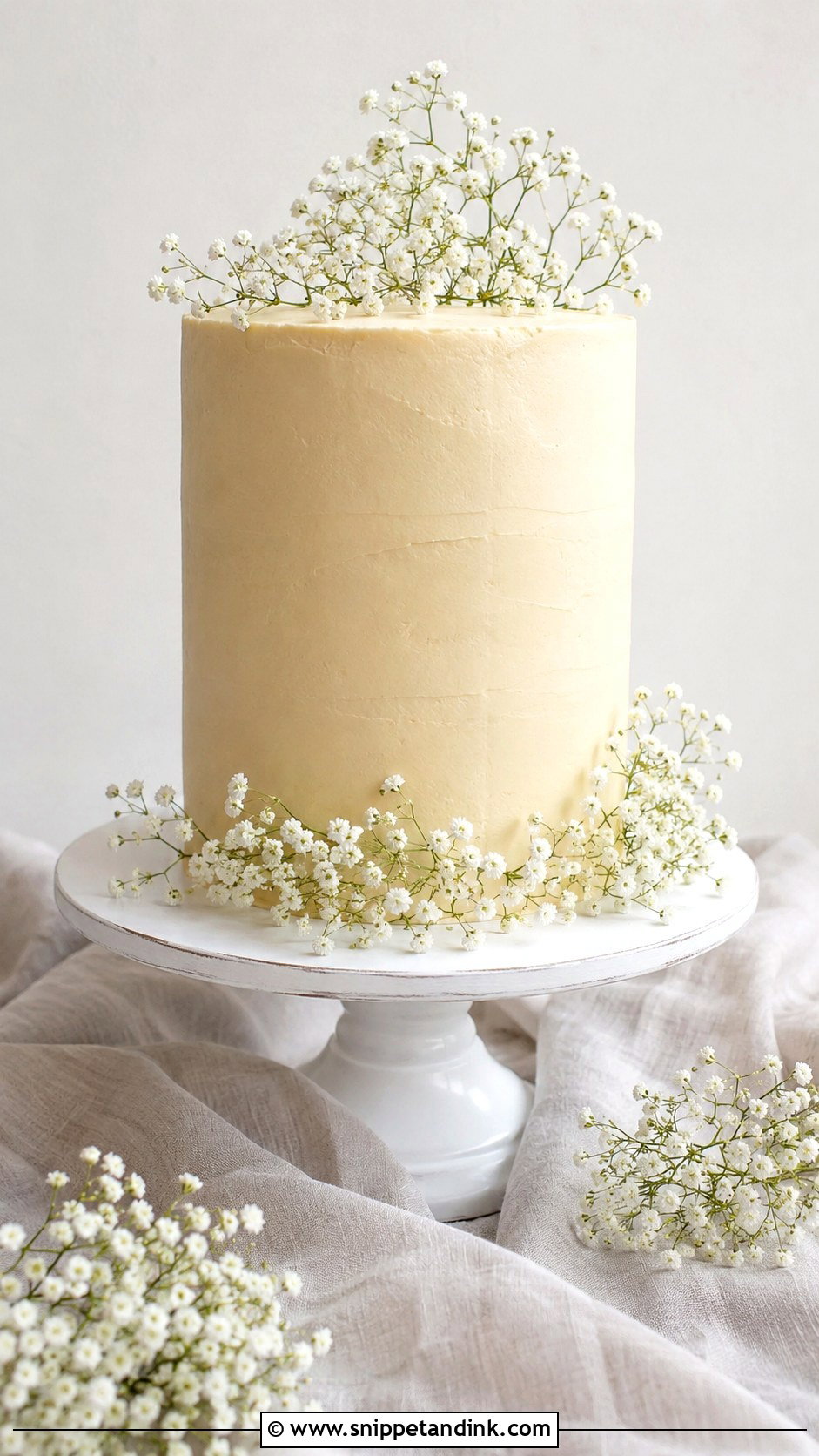 Beige Wedding Cake With Babys Breath - Snippet and Ink - 20 Simple Beige Wedding Cake Ideas