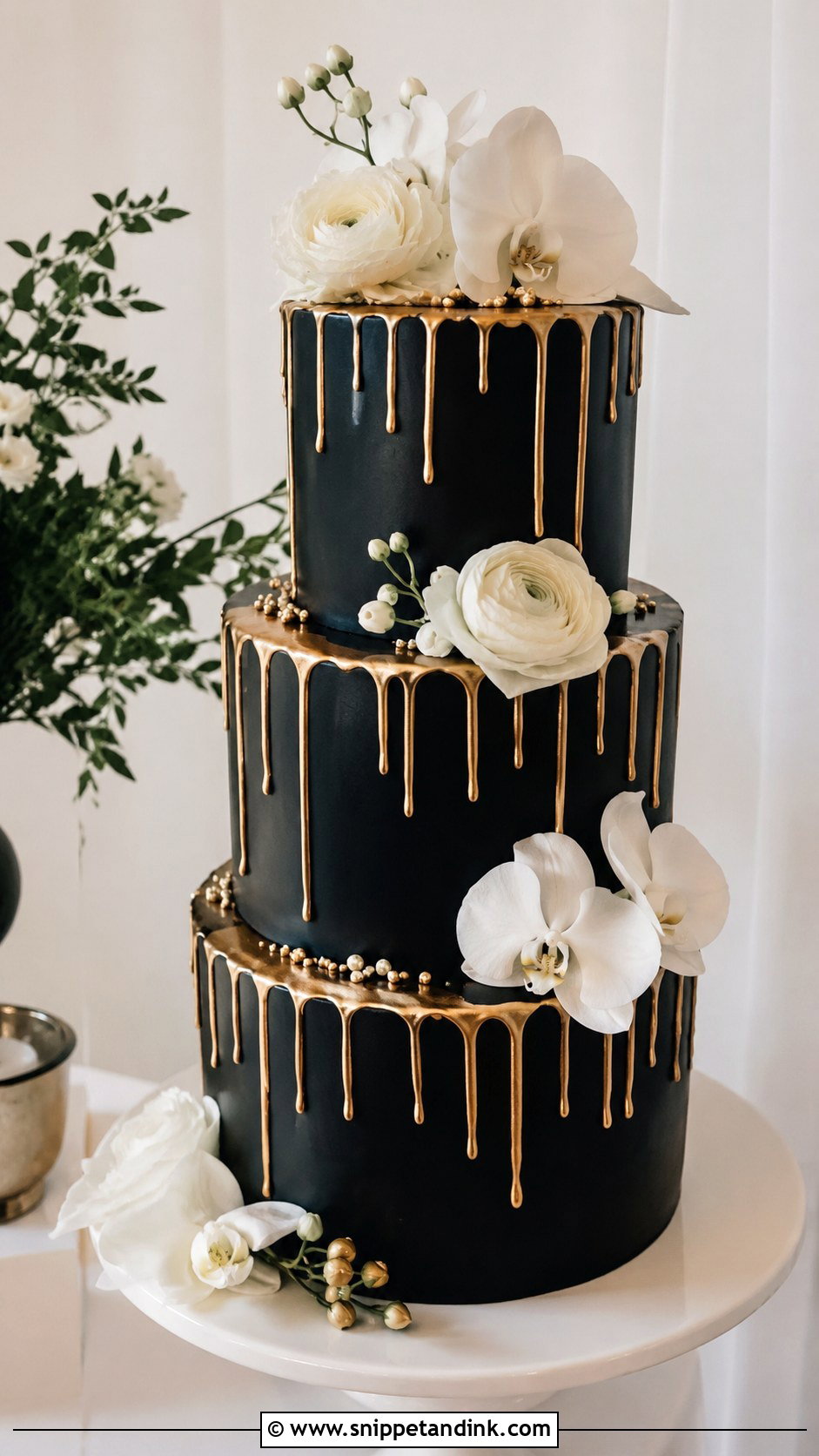 Black Gold Drip Cake With White Flowers - Snippet and Ink - 20 Black and Gold Drip Cake Ideas for Wedding