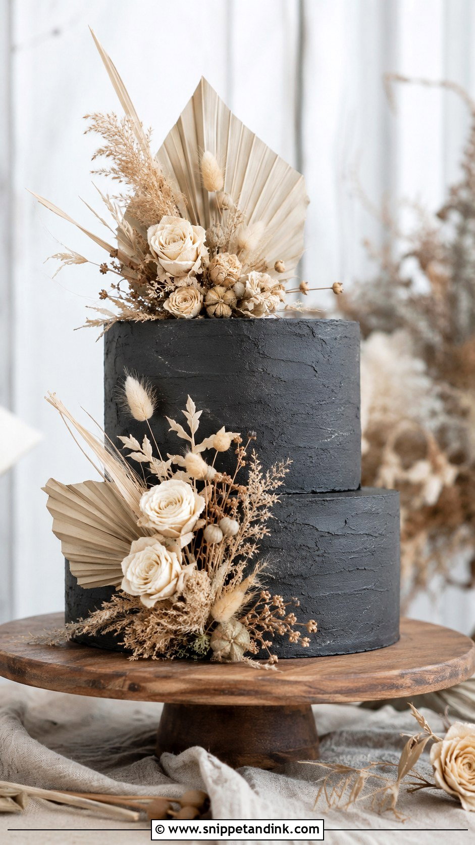 Black Wedding Cake With Dried Flowers - Snippet and Ink - 20 Black Flower Wedding Cake Ideas