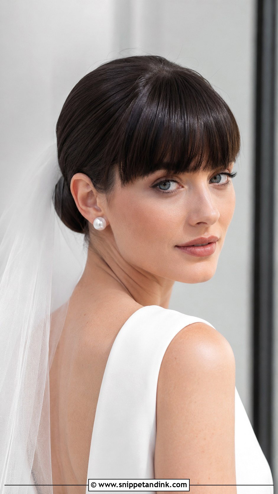 Blunt Bangs With Sleek Bun - Snippet and Ink - 25 Wedding Hair Bangs Ideas