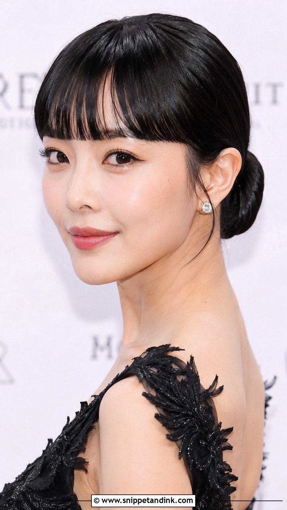 Blunt Bangs With a Low Chignon - Snippet and Ink - 20 Wedding Guest Hairstyles Bangs