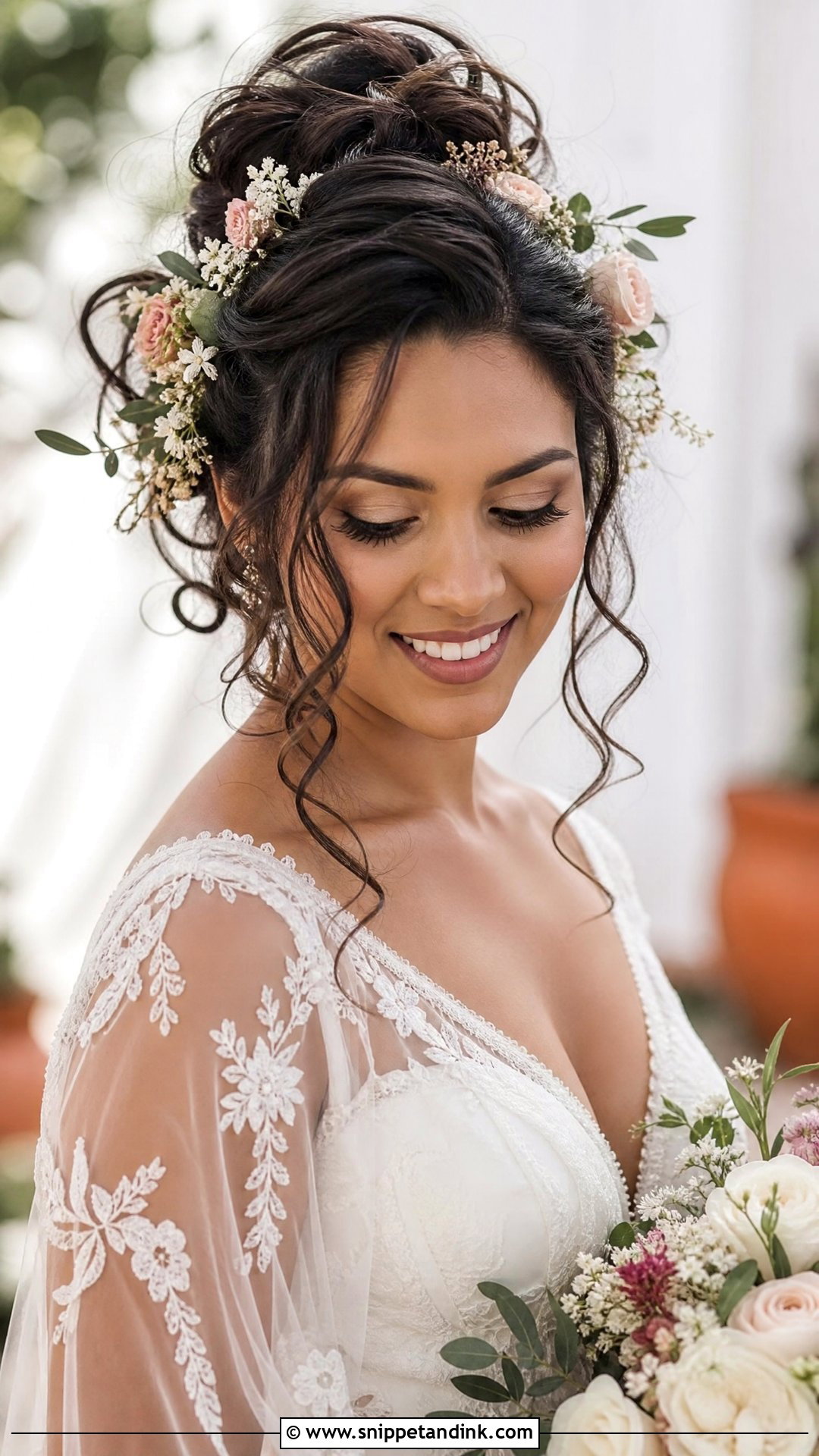 Bohemian Curly Updo With Flowers - Snippet and Ink - 30 Wedding Hairstyles for Curly Hair