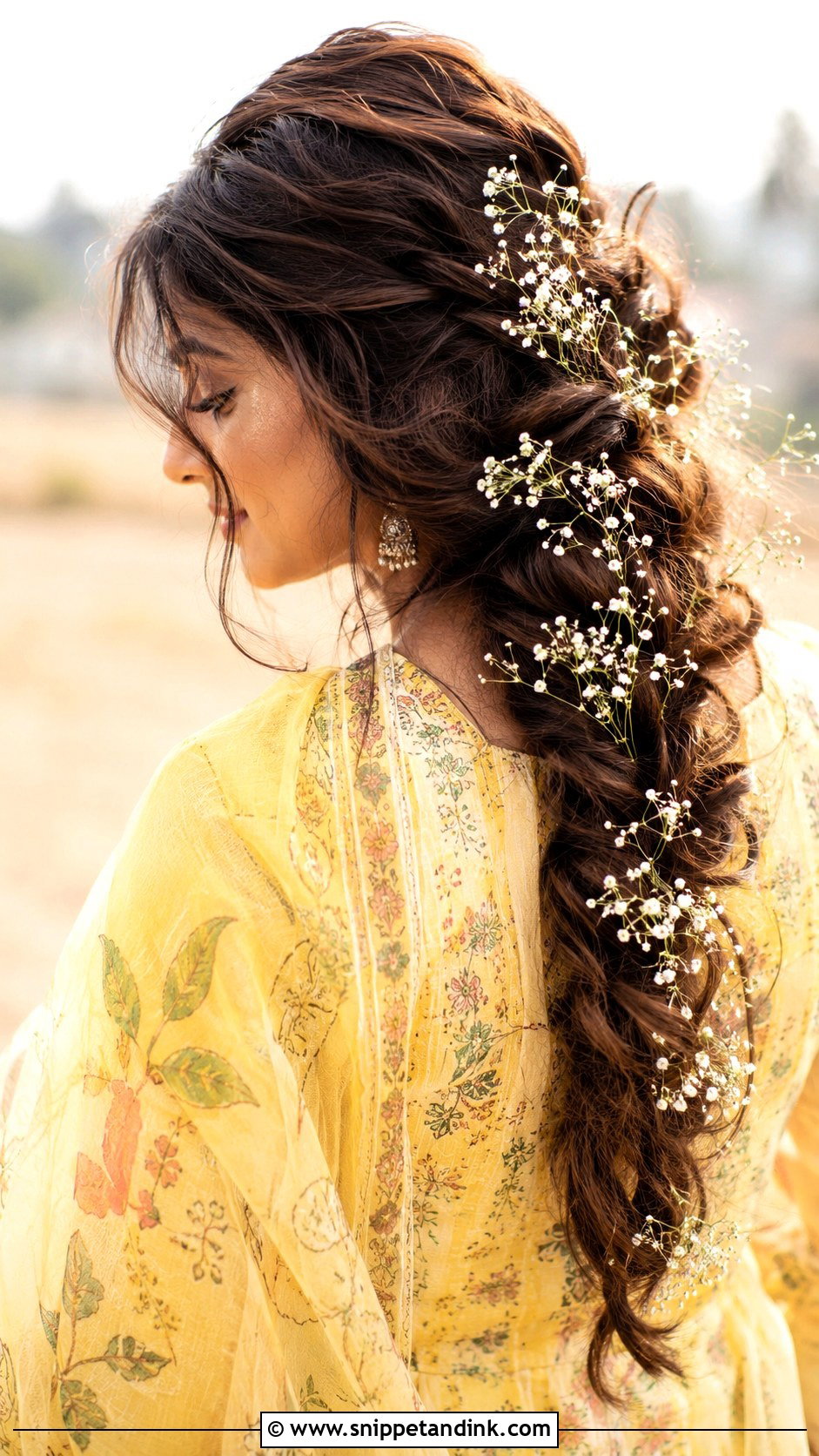 Boho Braid With Babys Breath - Snippet and Ink - 20 Haldi Braid Hairstyles for Bride