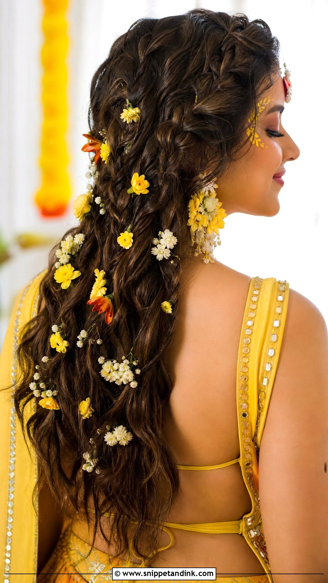 Boho Braids With Mixed Flowers - Snippet and Ink - 20 Hairstyle for Haldi Bride Ideas