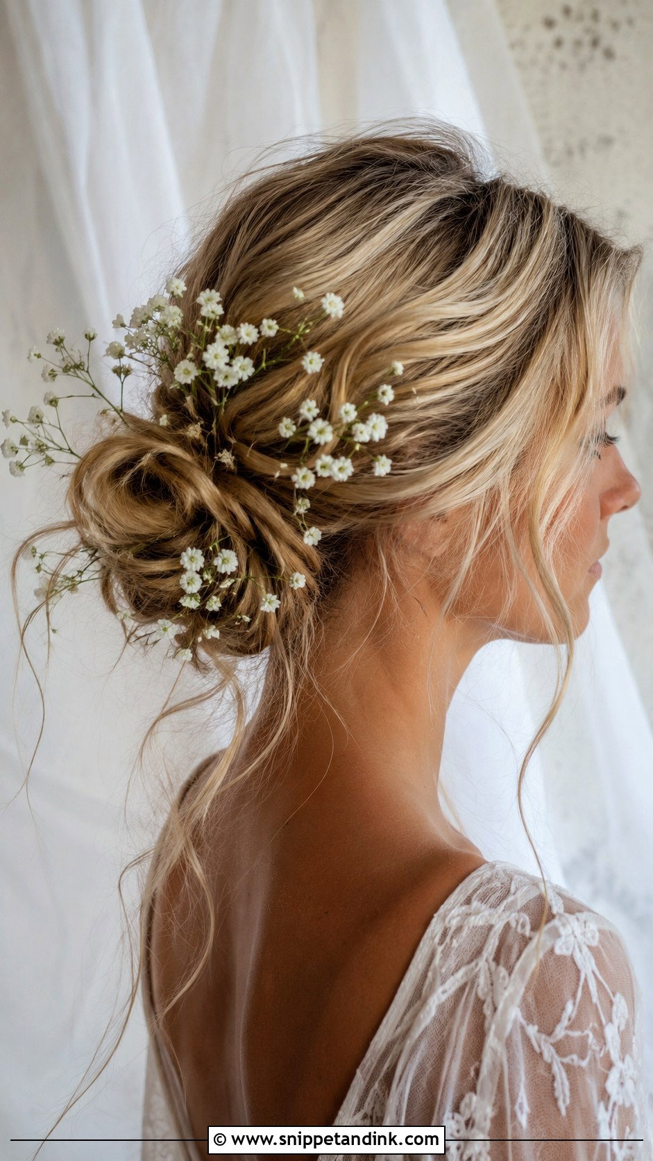 Boho Bun With Babys Breath - Snippet and Ink - 25 Wedding Bun Hairstyle Ideas