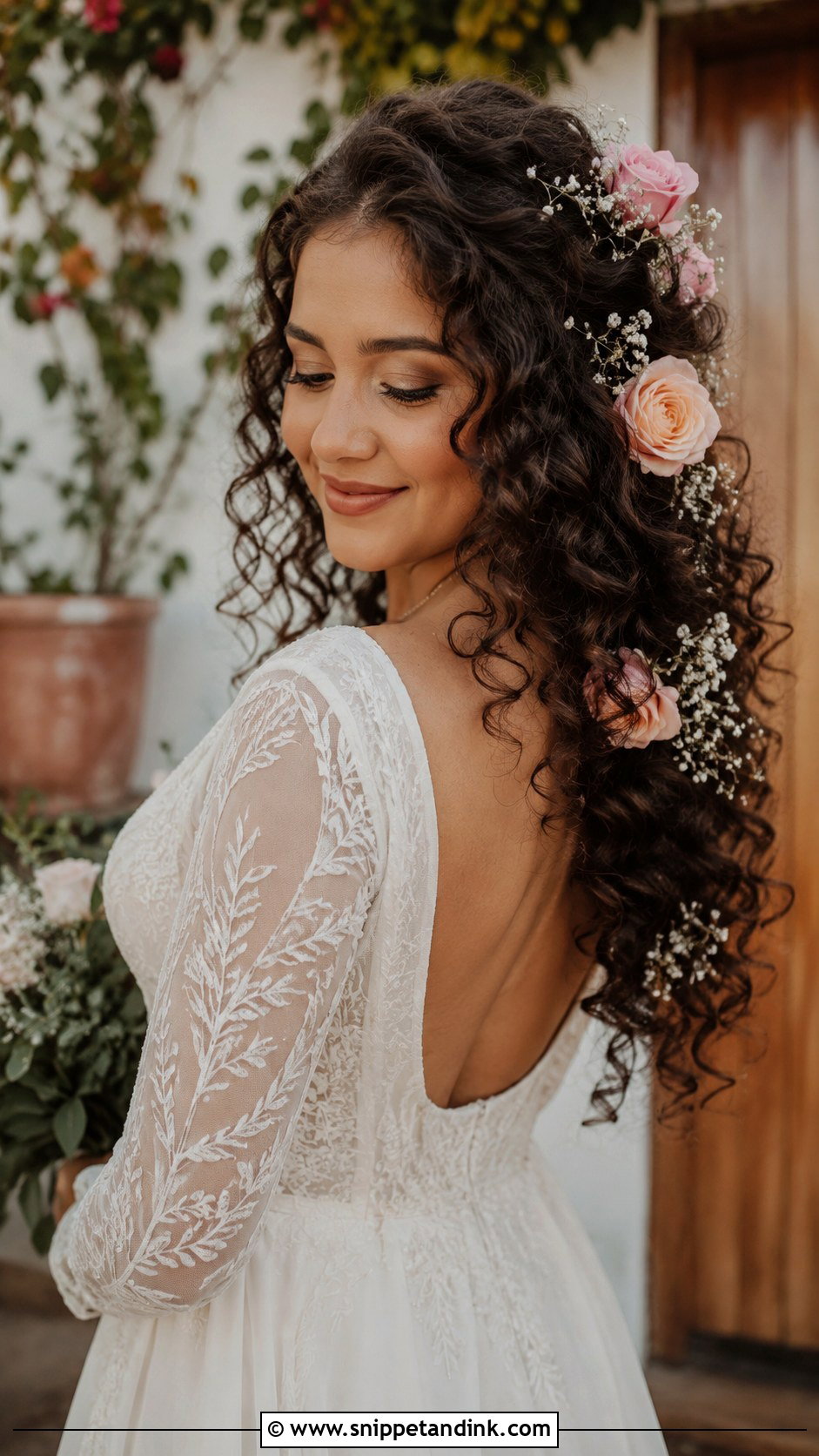 Boho Curly Hairstyle With Fresh Flowers - Snippet and Ink - 25 Curly Bridal Hairstyles
