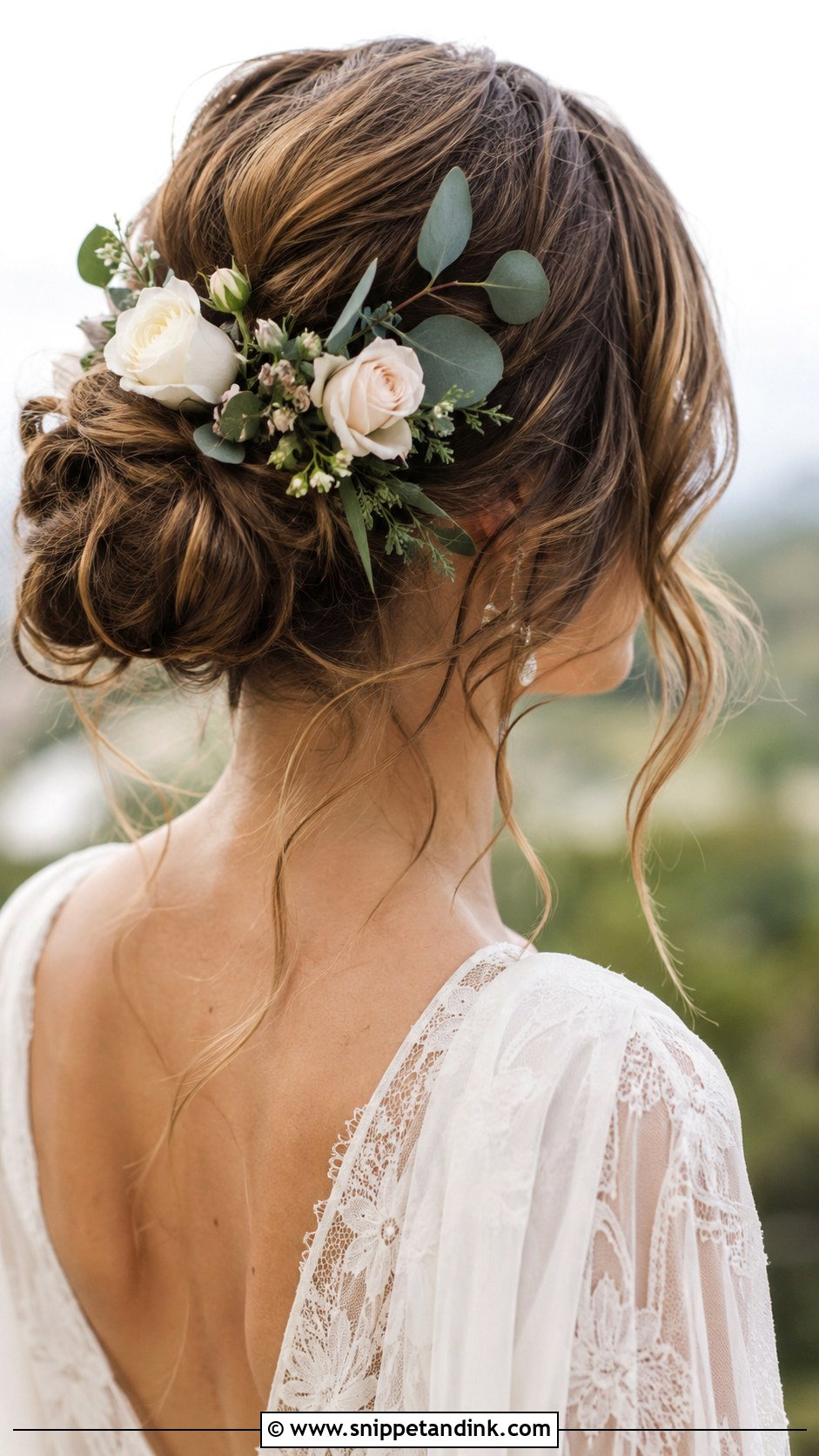 Boho Low Bun With Flowers - Snippet and Ink - 30 Low Updo Wedding Hair Ideas