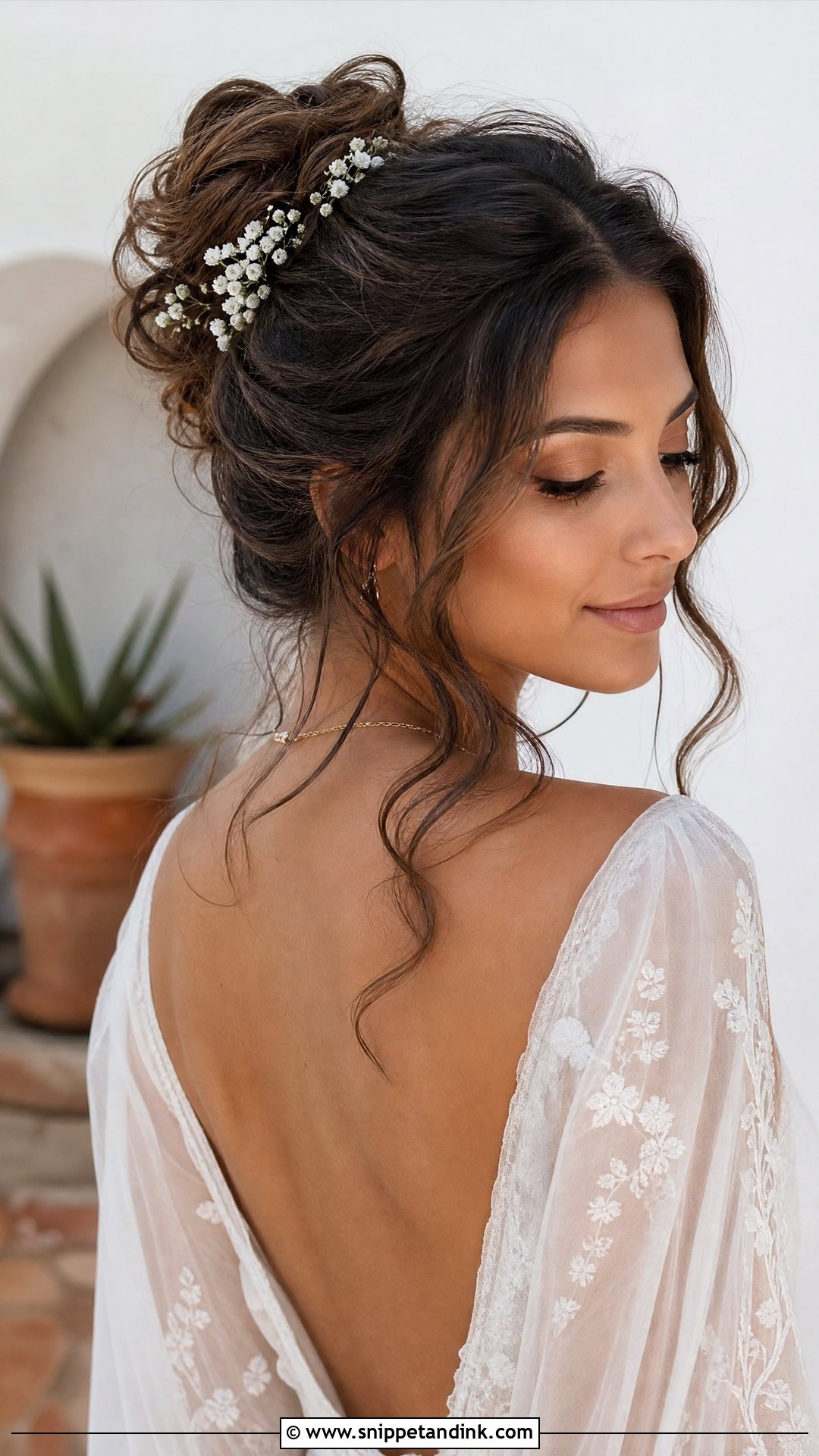 Boho Messy Bun for Brunette Brides - Snippet and Ink - 20 Dark Hair Wedding Hairstyles Brides