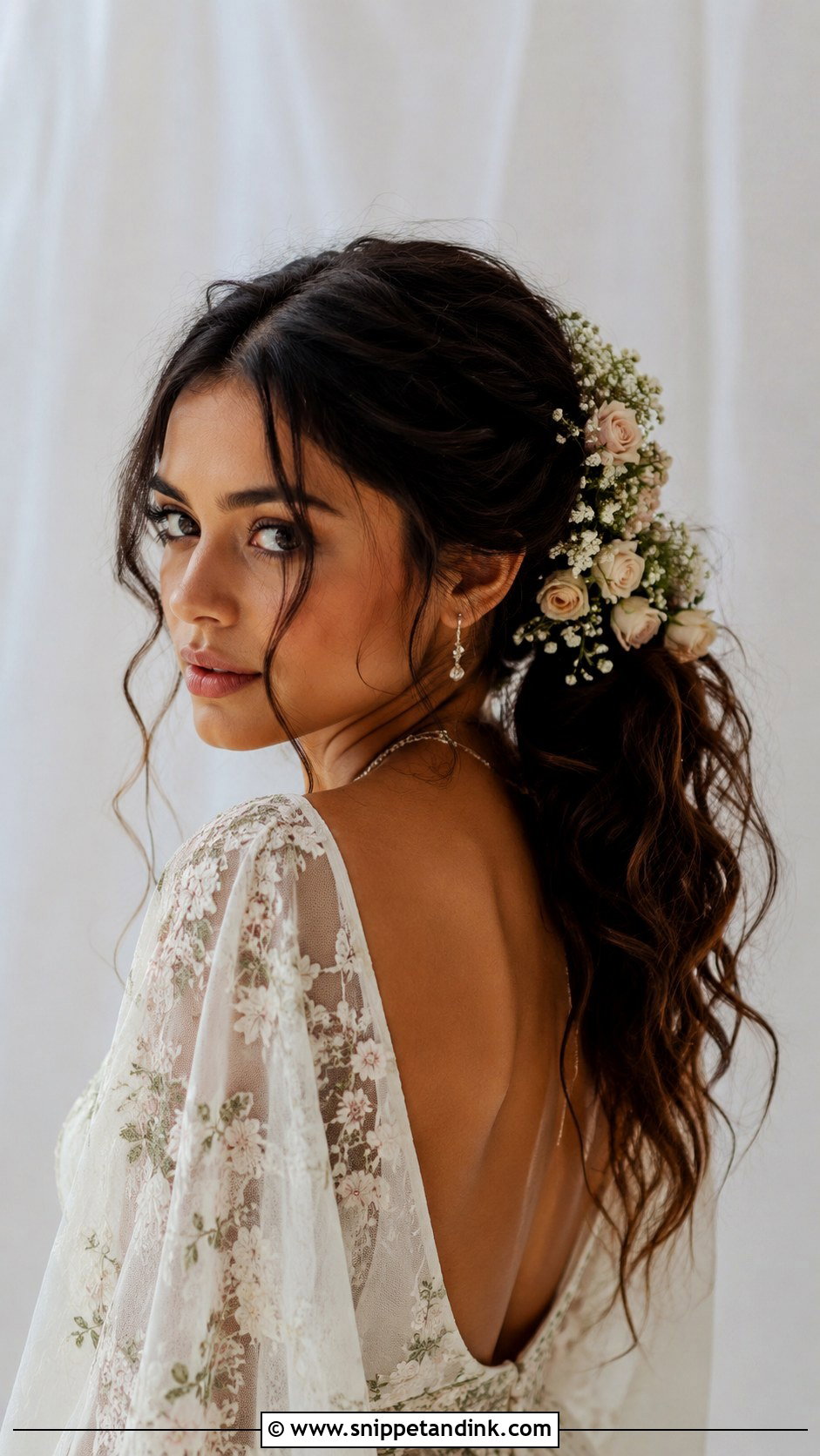 Boho Textured Ponytail With Flowers - Snippet and Ink - 20 Textured Ponytail Wedding Ideas