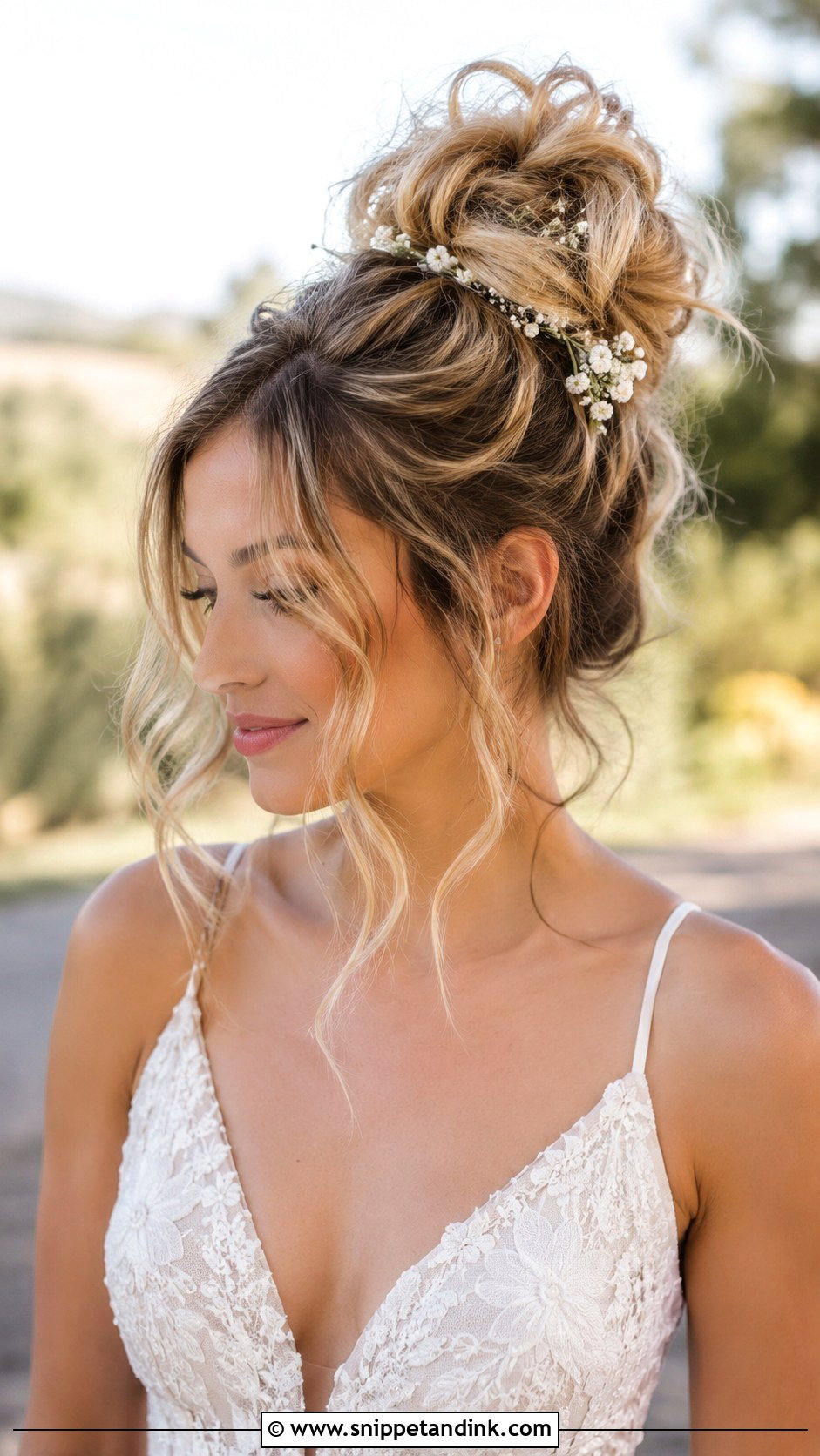 Boho Top Knot With Loose Tendrils - Snippet and Ink - 20 Hippie Wedding Hair Ideas