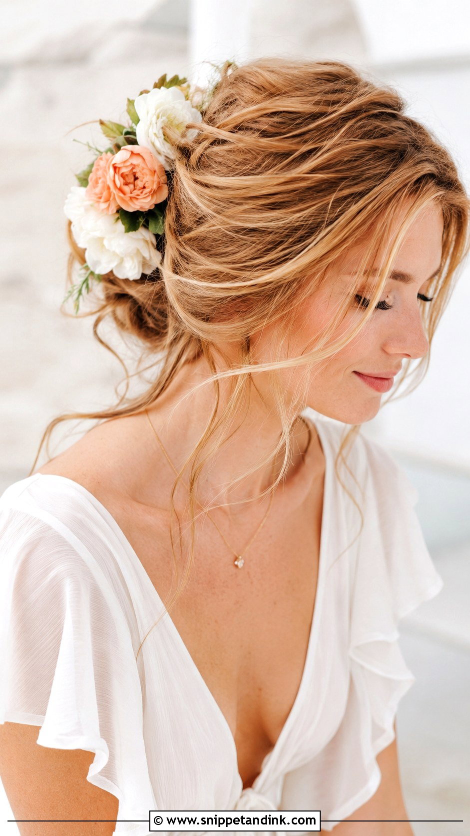 Boho Tousled Updo With Flowers - Snippet and Ink - 20 Up Do Wedding Hairstyles