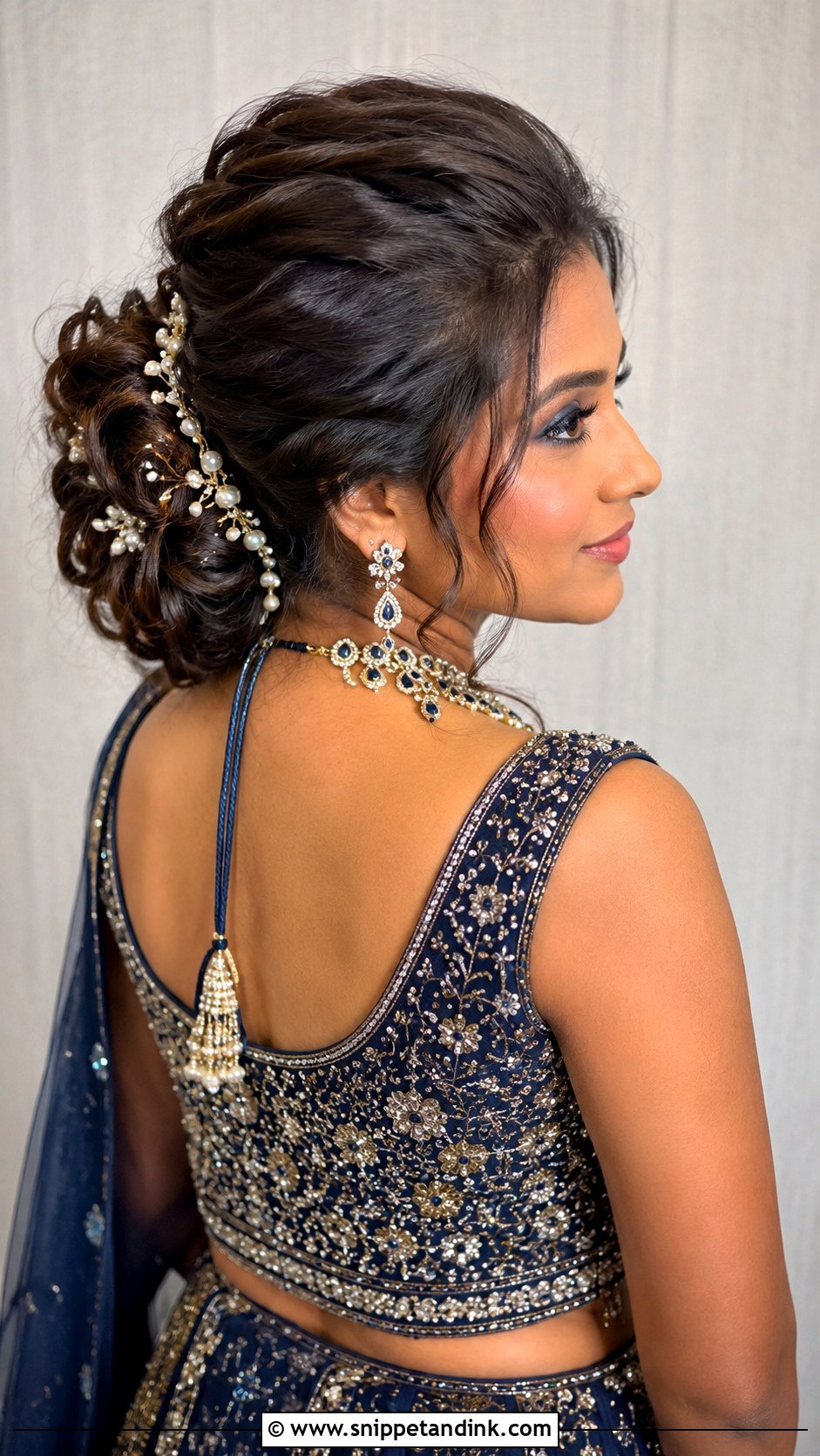 Bouffant Bun With Curls - Snippet and Ink - 25 Indian Weddings Bridal Hair Styles