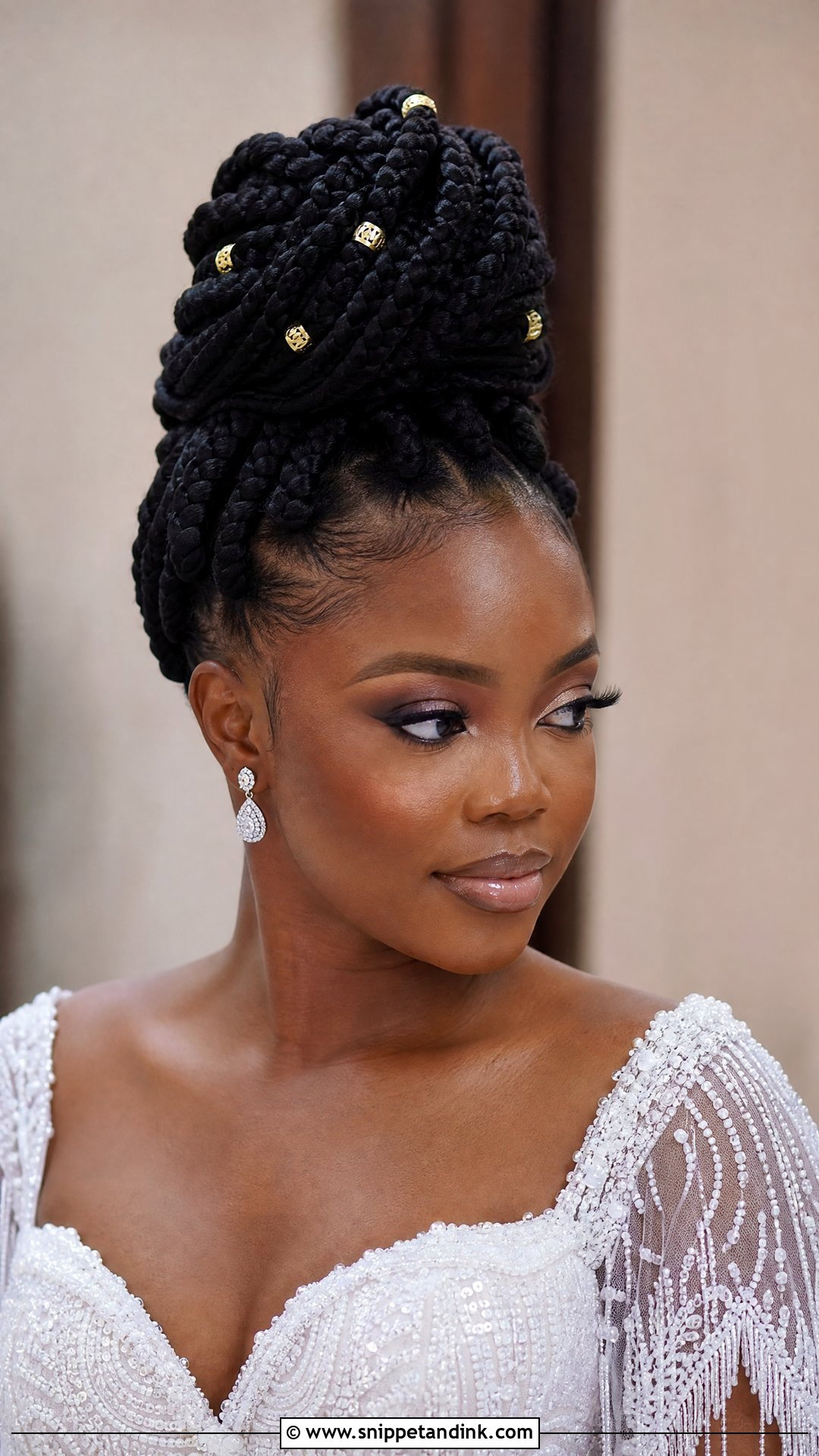 Box Braid Bun for Black Brides - Snippet and Ink - 20 Wedding Bun Hairstyles for Black Women