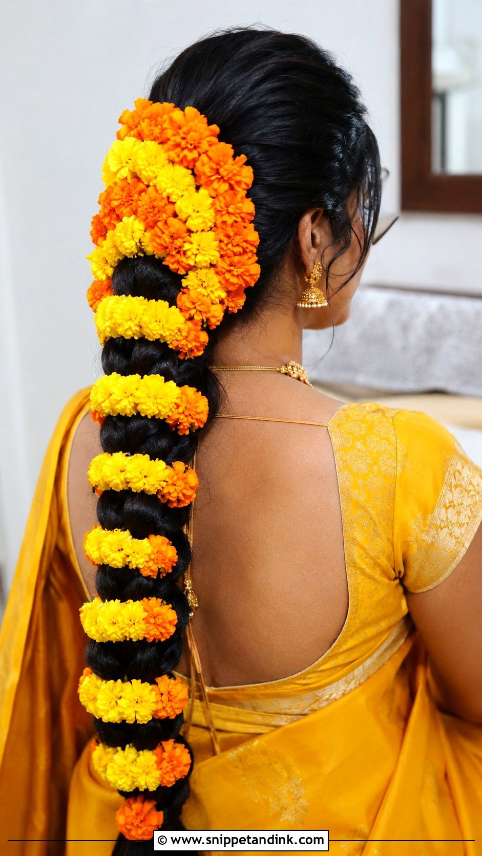 Braid With Marigold Flowers - Snippet and Ink - 25 Marathi Bride Hairstyle Ideas
