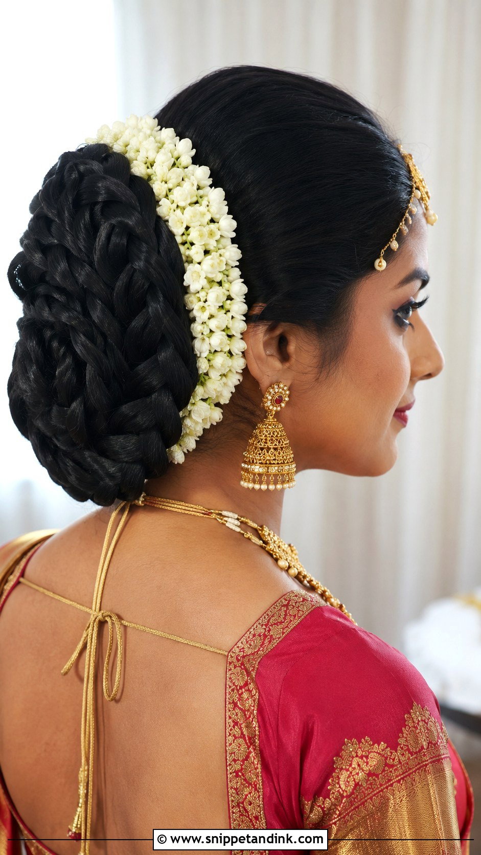 Braided Bun With Fresh Jasmine - Snippet and Ink - 25 Indian Wedding Hair Ideas