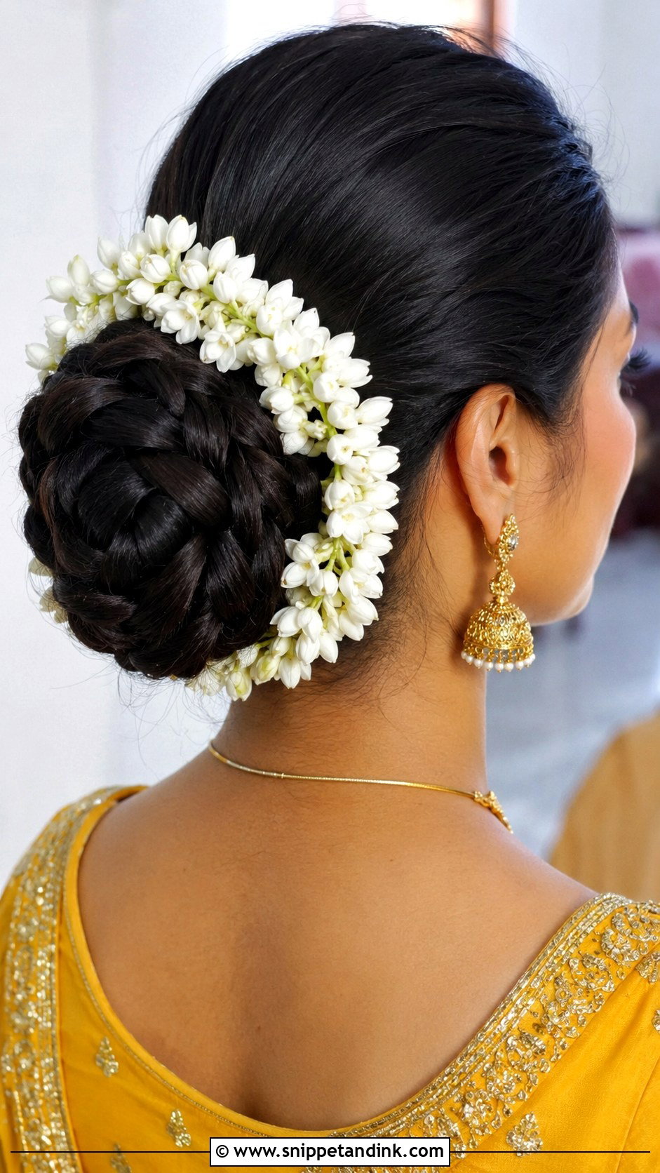 Braided Bun With Jasmine - Snippet and Ink - 25 Haldi Bride Hairstyle Ideas