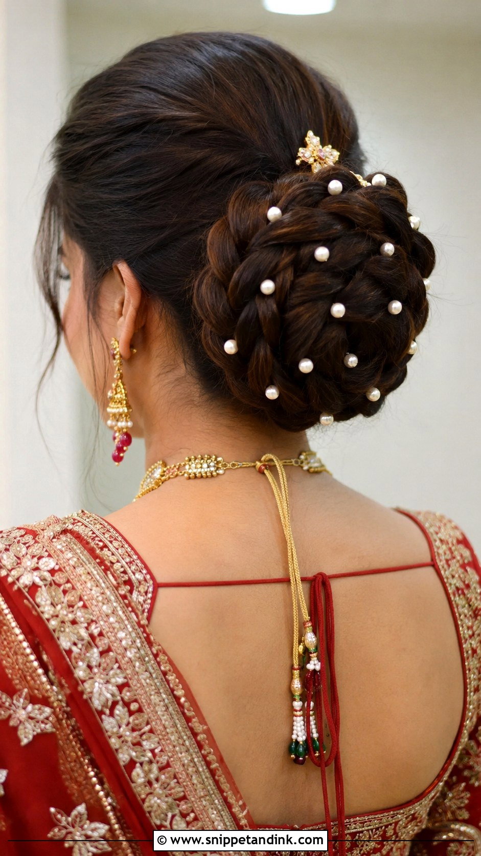 Braided Bun With Pearls - Snippet and Ink - 20 Indian Hairstyles for Marriage Function