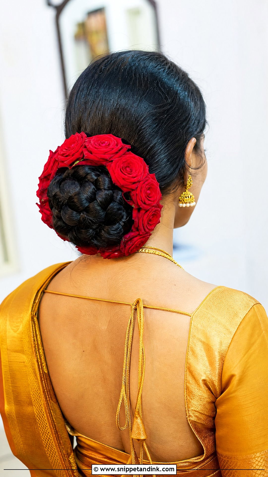 Braided Bun With Rose Garland - Snippet and Ink - 20 Tamil Bridal Hairstyles