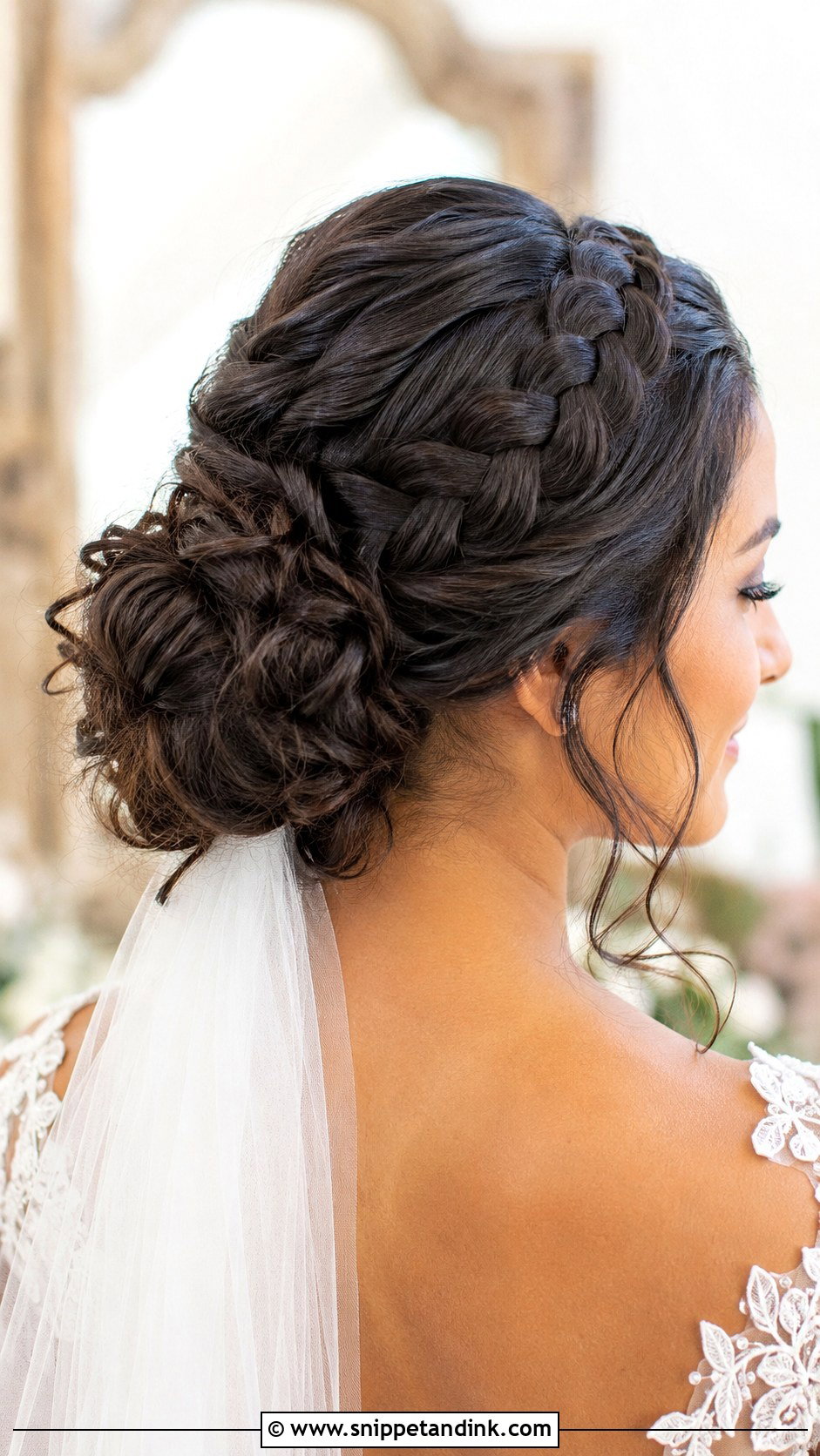 Braided Halo With Curly Bun - Snippet and Ink - 20 Long Curled Hairstyles for Wedding