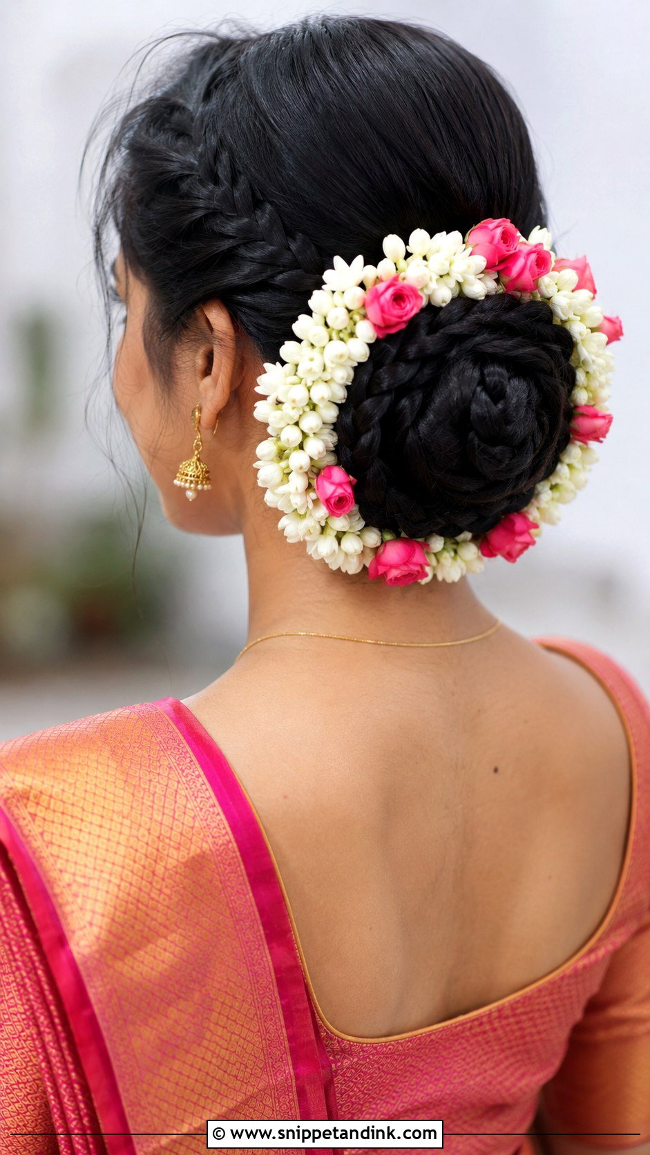 Braided Low Bun With Flowers - Snippet and Ink - 30 Indian Bridal Bun Hairstyles