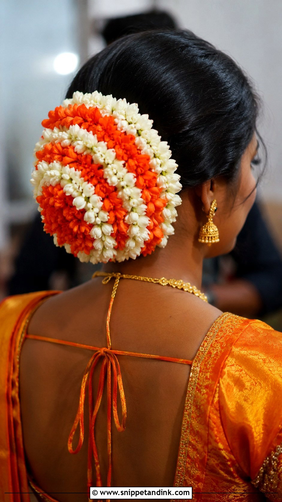 Bridal Bun With Jasmine And Kanakambaram - Snippet and Ink - 20 South Indian Bride Hairstyle with Jasmine Flowers