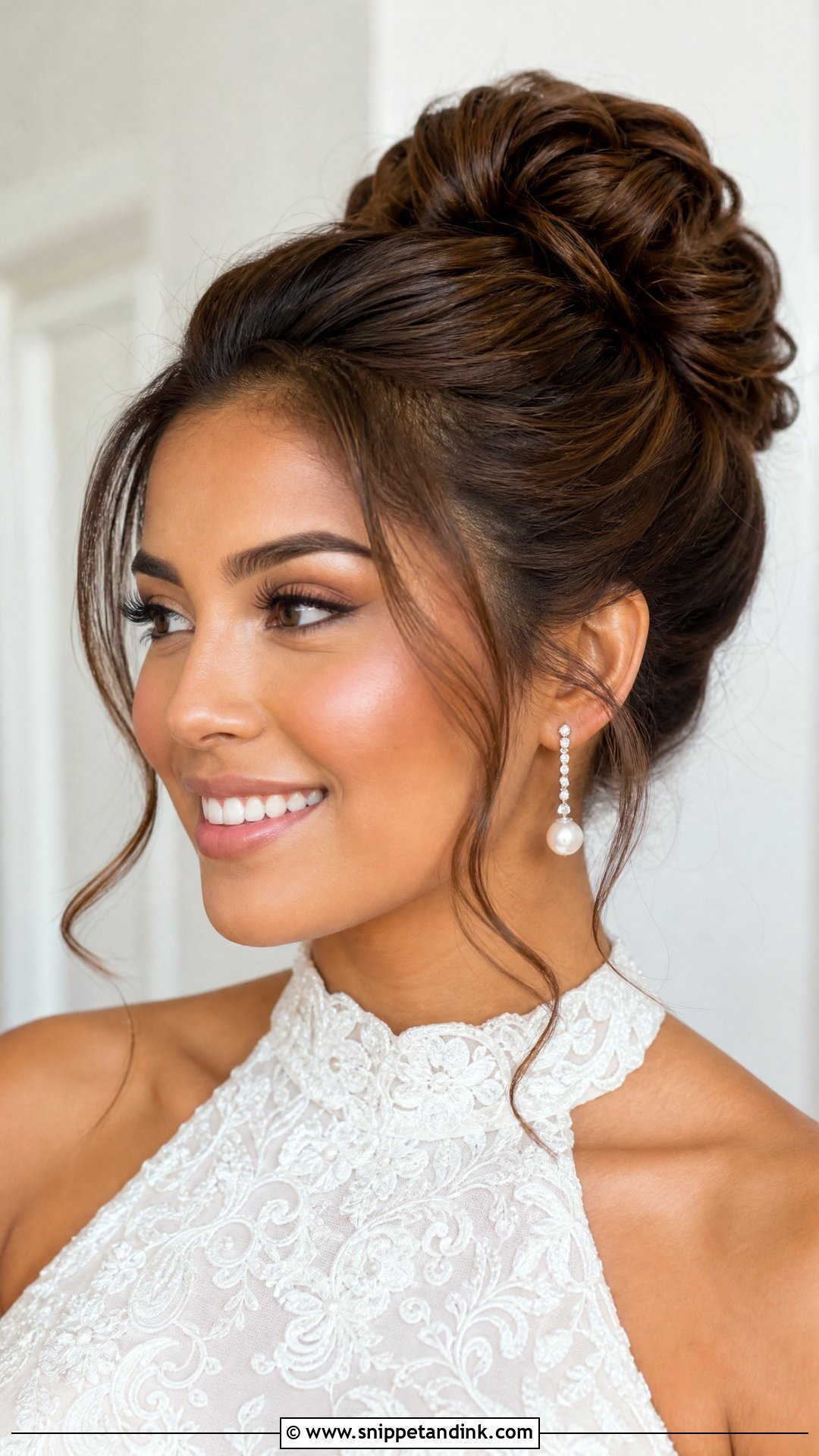 Bridal High Bun With Soft Tendrils - Snippet and Ink - 15 Front Hair Styles for Bride