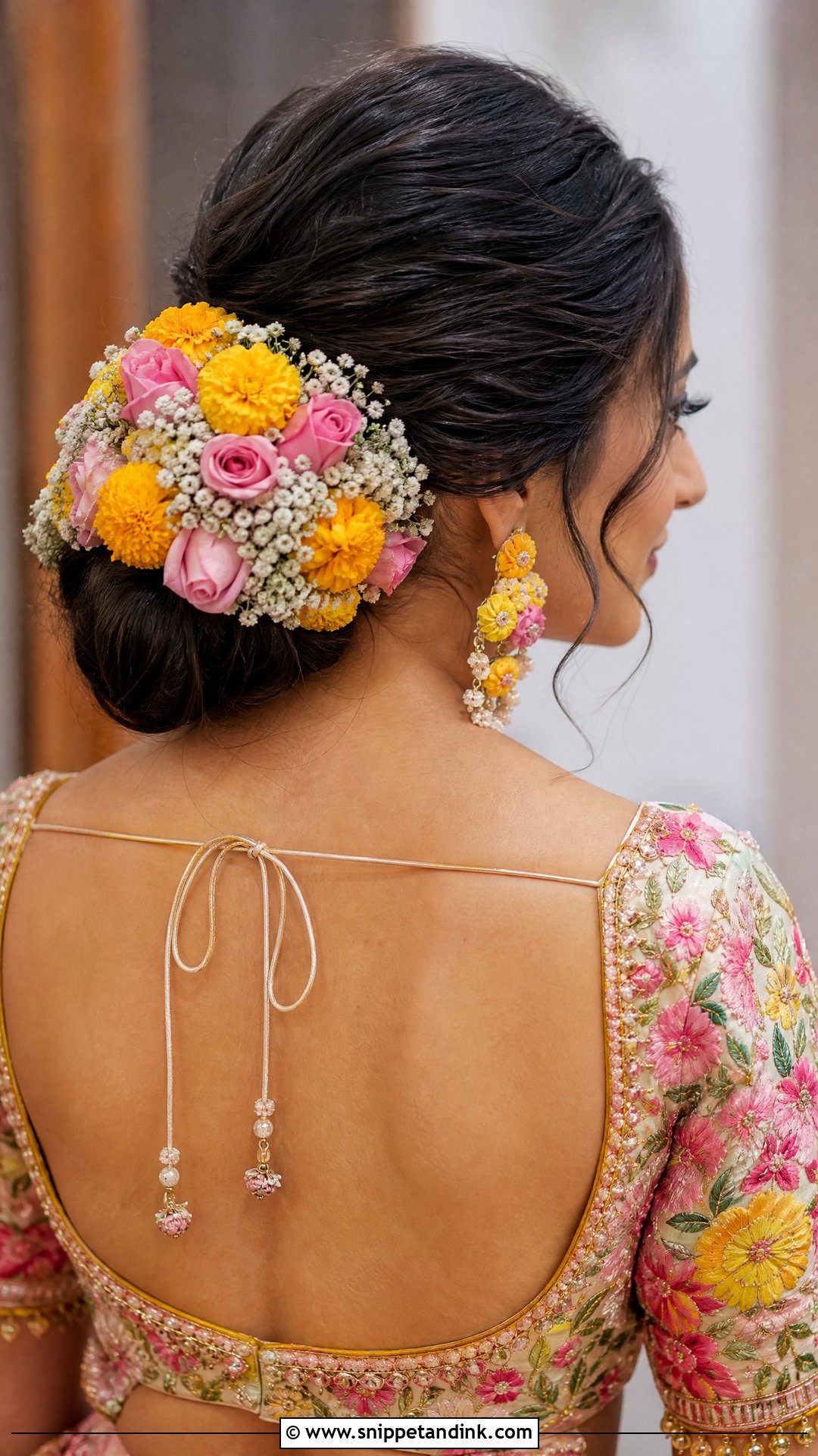 Bridal Mehendi Flower Bun - Snippet and Ink - 15 Bridal Mehendi Hairstyles
