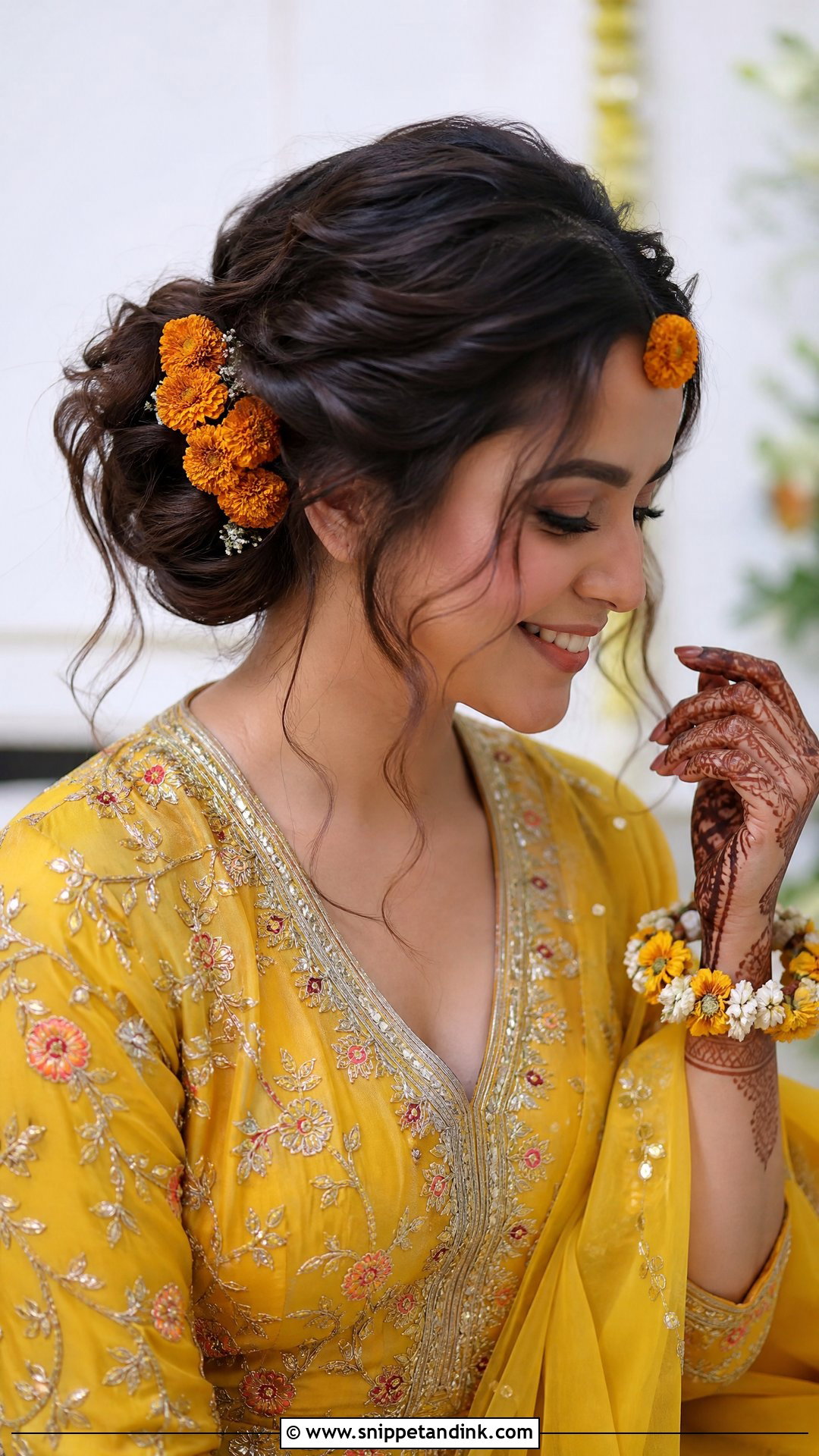Bridal Mehendi Messy Bun - Snippet and Ink - 15 Bridal Mehendi Hairstyles