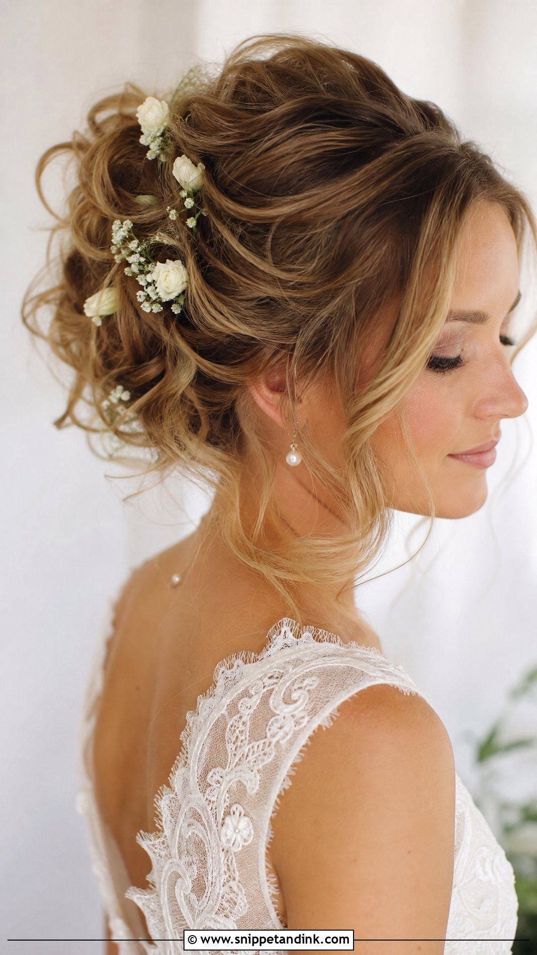 Bridal Messy Bun With Flowers - Snippet and Ink - 15 Bridal Hairstyles Flowers