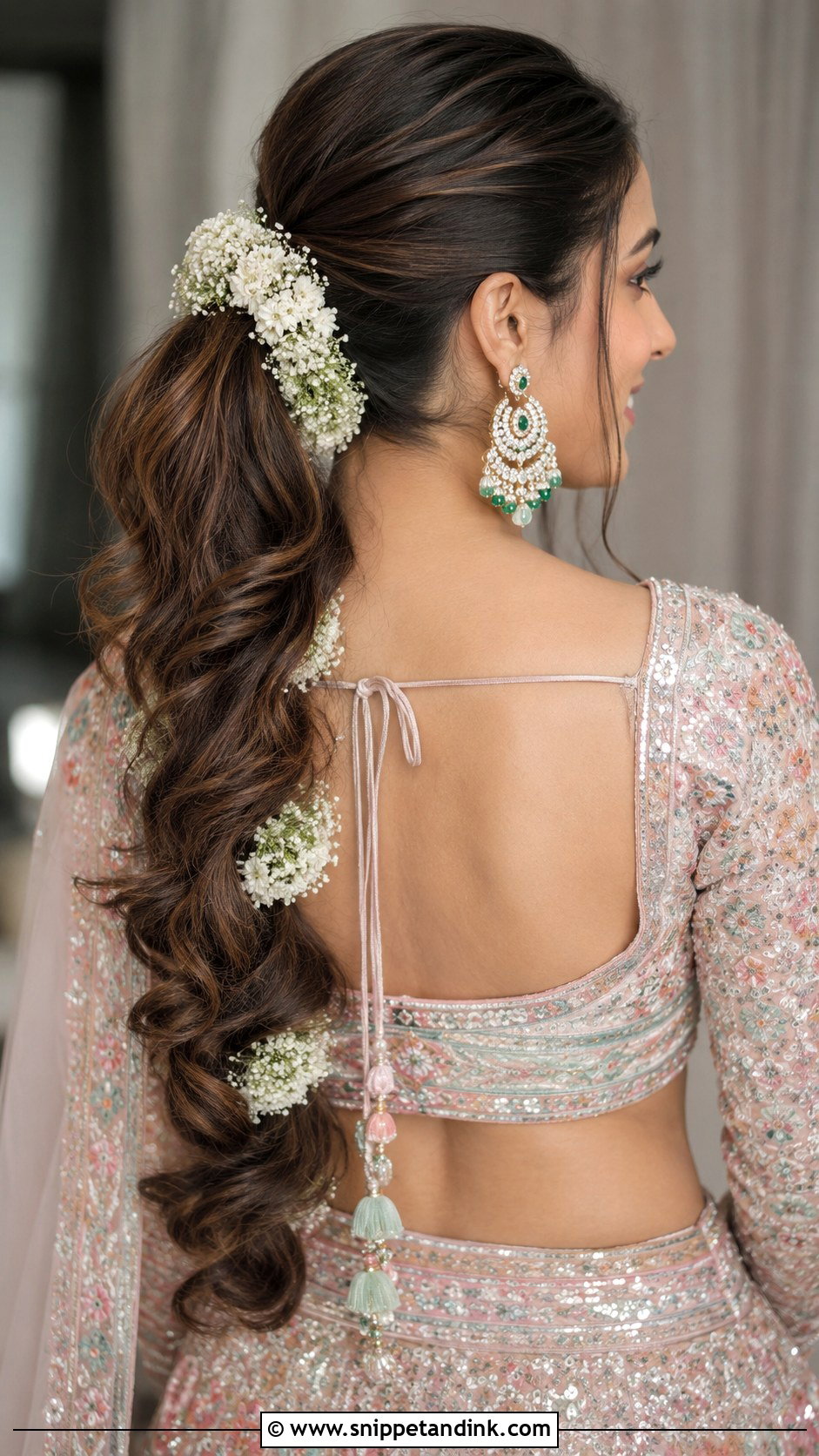 Bridal Ponytail With Floral Wrap - Snippet and Ink - 25 Traditional Indian Weddings Bridal Hairstyles