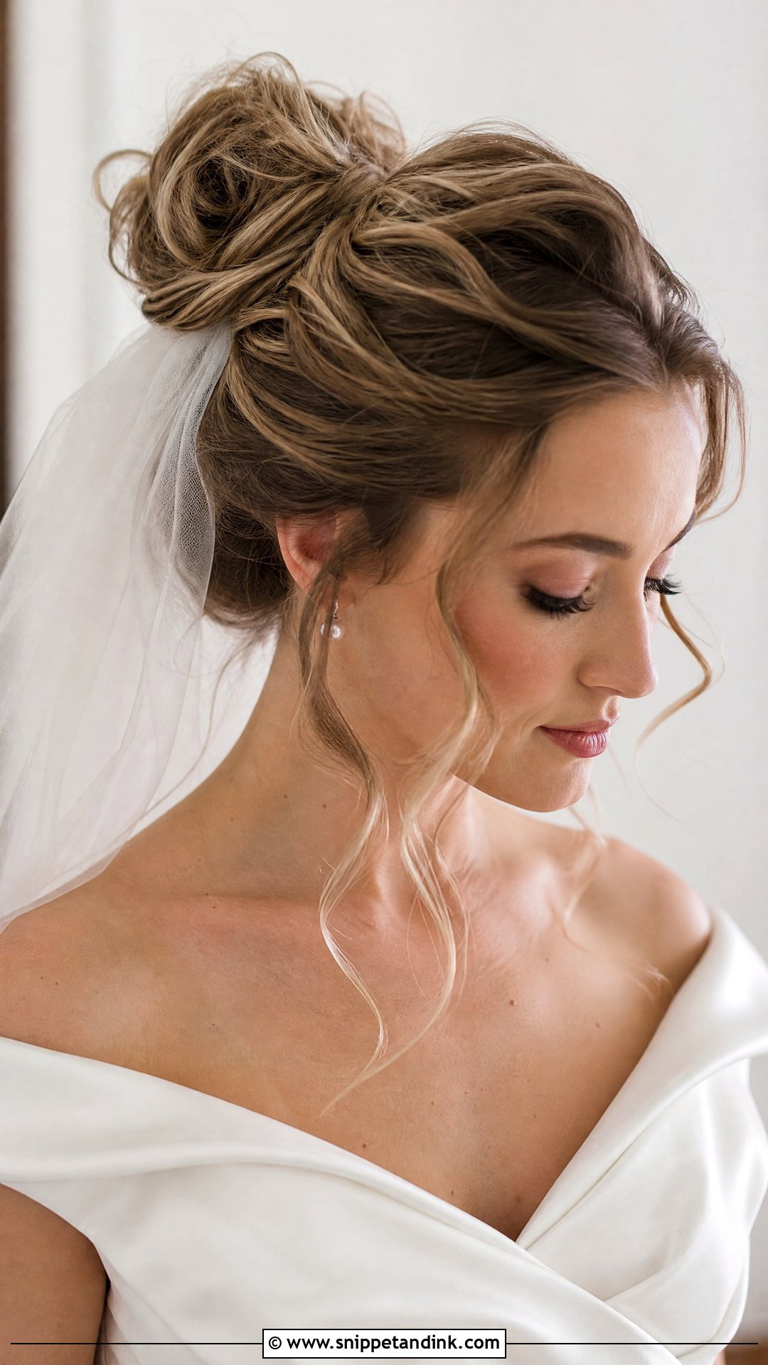 Bride Messy Bun With Veil - Snippet and Ink - 15 Bride Messy Updo Hairstyles
