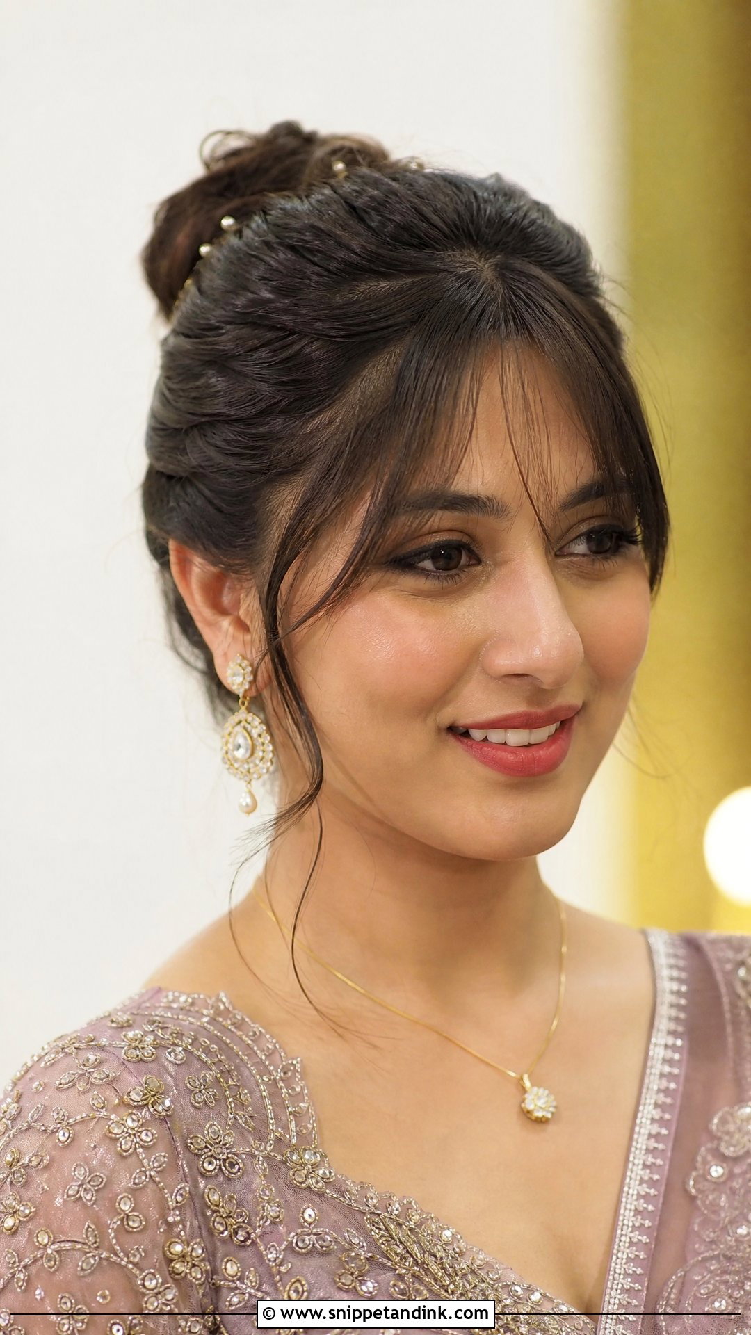 Bun With Front Bangs Hairstyle - Snippet and Ink - 20 Indian Wedding Buns Hairstyles