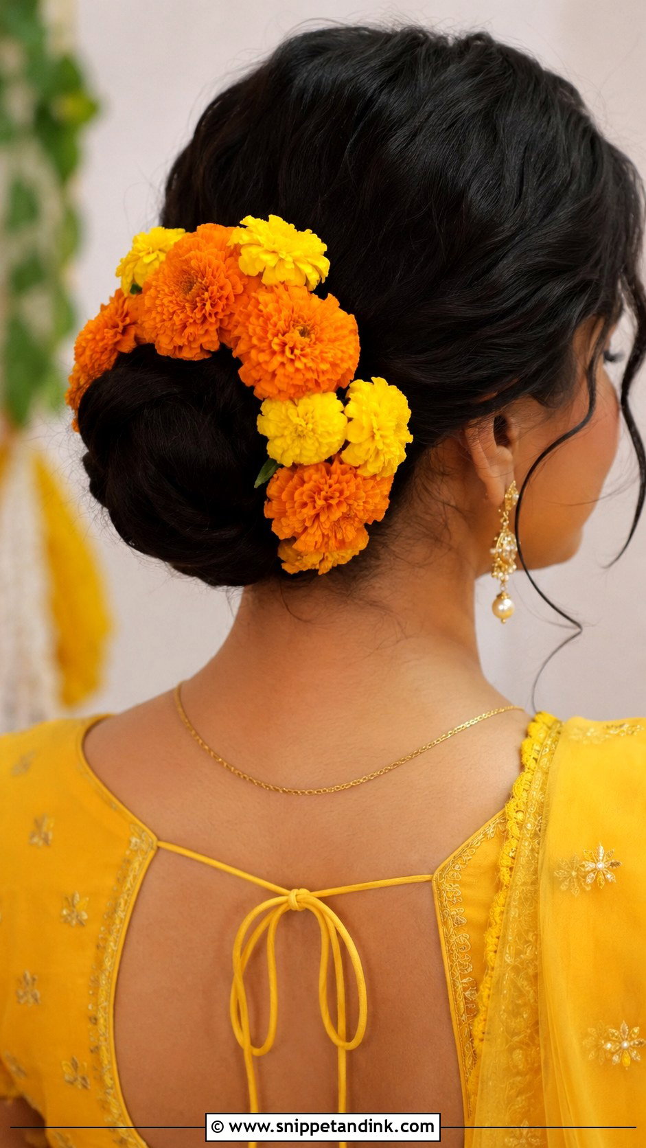 Bun With Genda Phool - Snippet and Ink - 30 Indian Bridal Bun Hairstyles