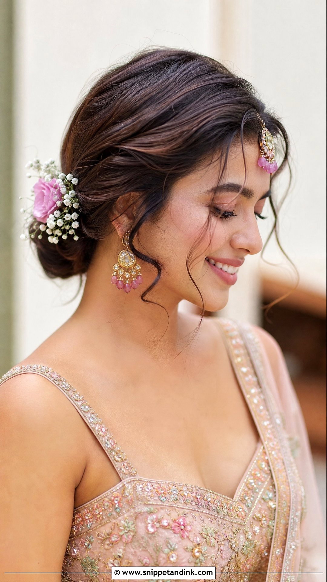 Bun With Loose Front Curls - Snippet and Ink - 20 Indian Wedding Bun Hairstyle Ideas
