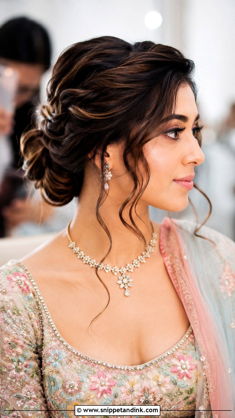 Bun With Loose Tendrils - Snippet and Ink - 25 Indian Bun Hairstyles for Wedding