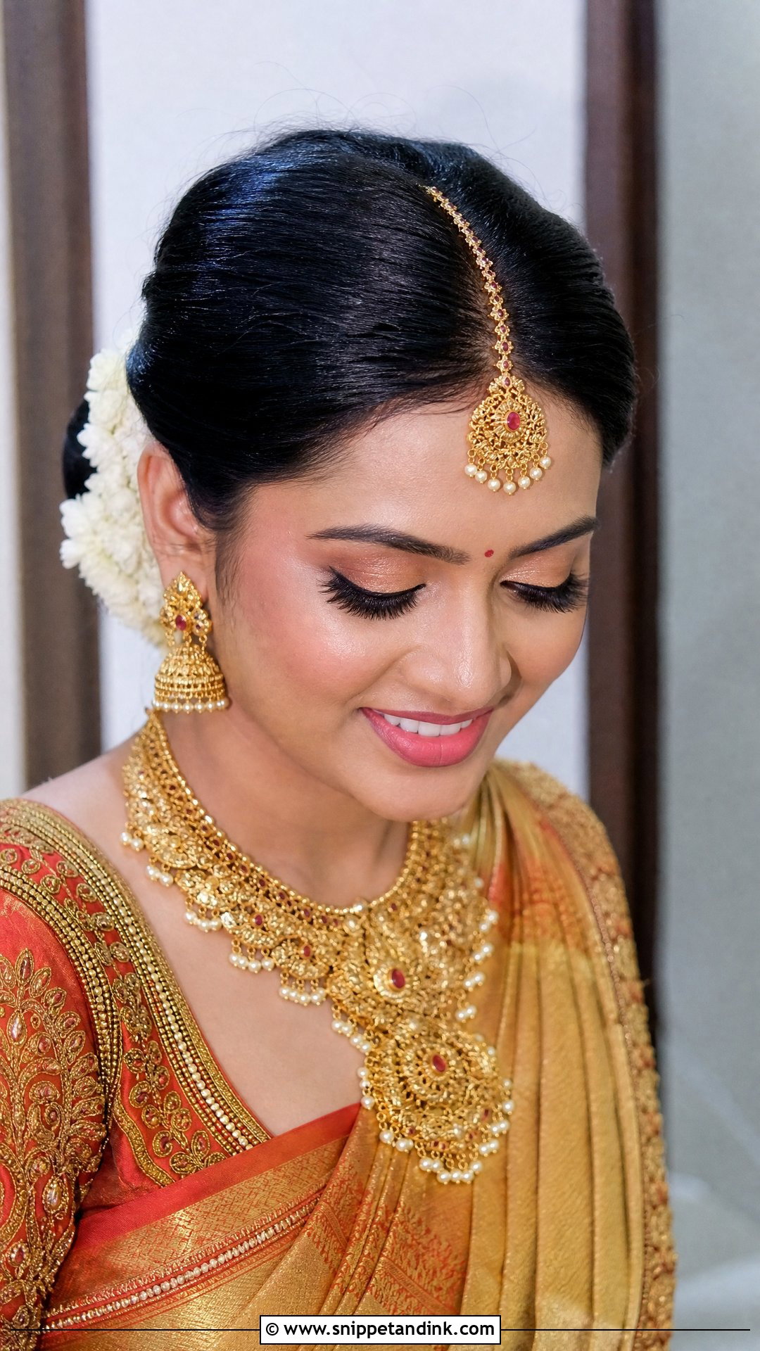 Bun With Maang Tikka Hairstyle - Snippet and Ink - 20 Indian Wedding Buns Hairstyles