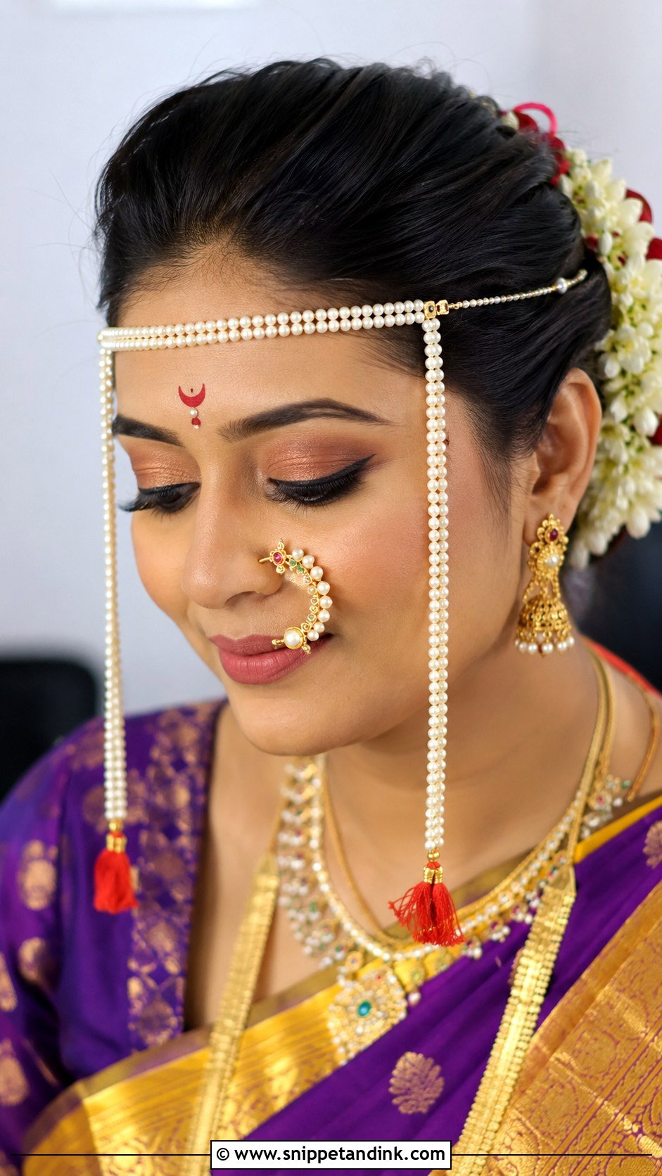 Bun With Mundavalya Across Forehead - Snippet and Ink - 25 Marathi Bride Hairstyle Ideas