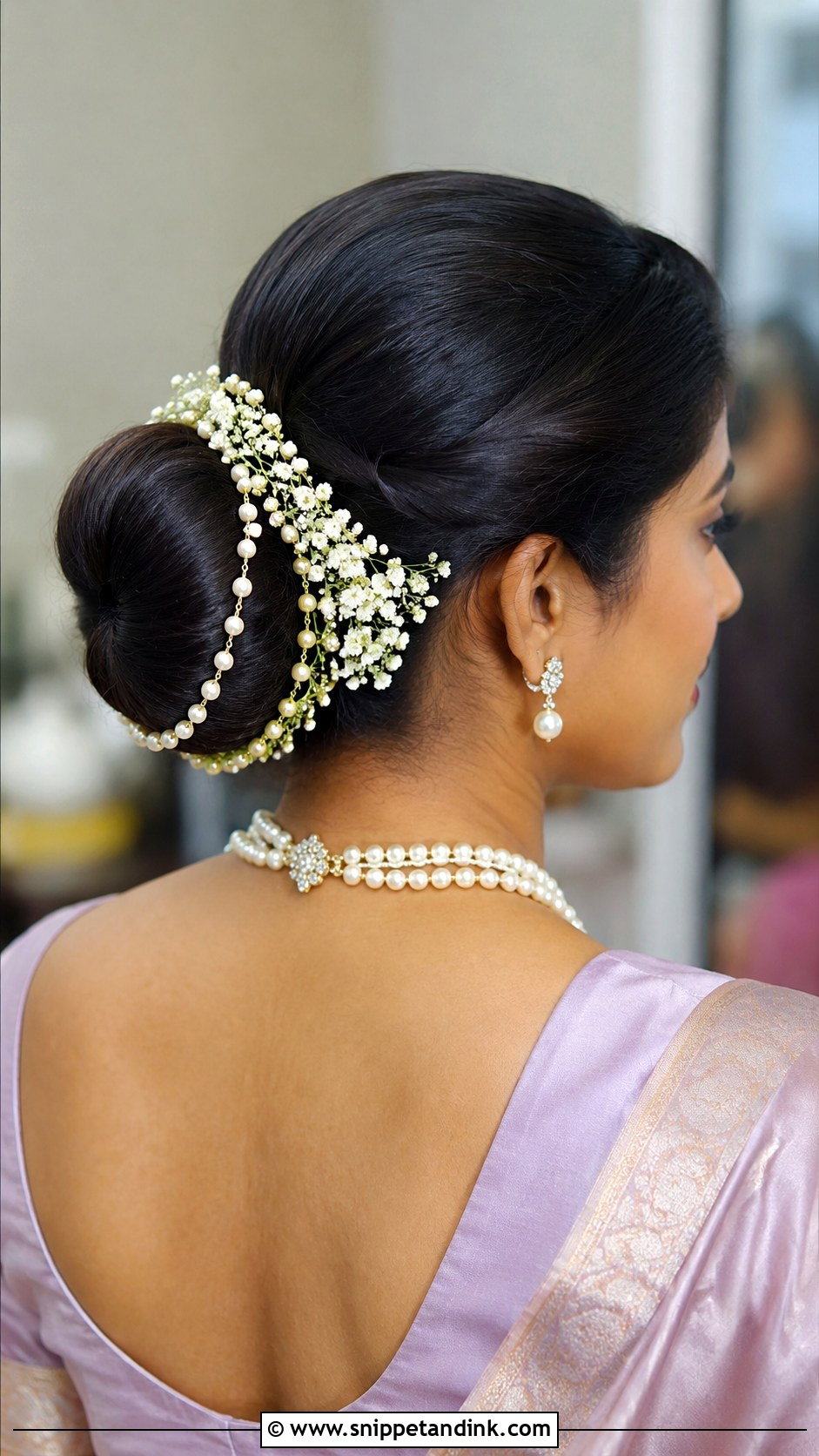 Bun With Pearl And Flower Accents - Snippet and Ink - 35 South Indian Wedding Hairstyles