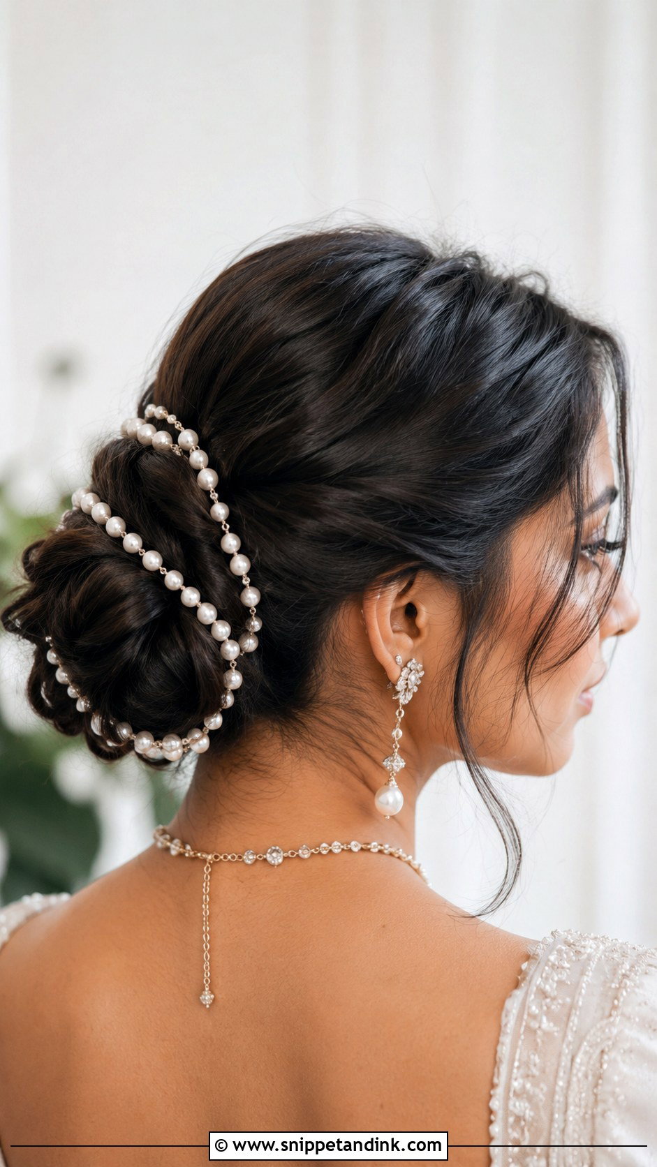 Bun With Pearl Strand Accents - Snippet and Ink - 25 Indian Wedding Bun Hairstyles