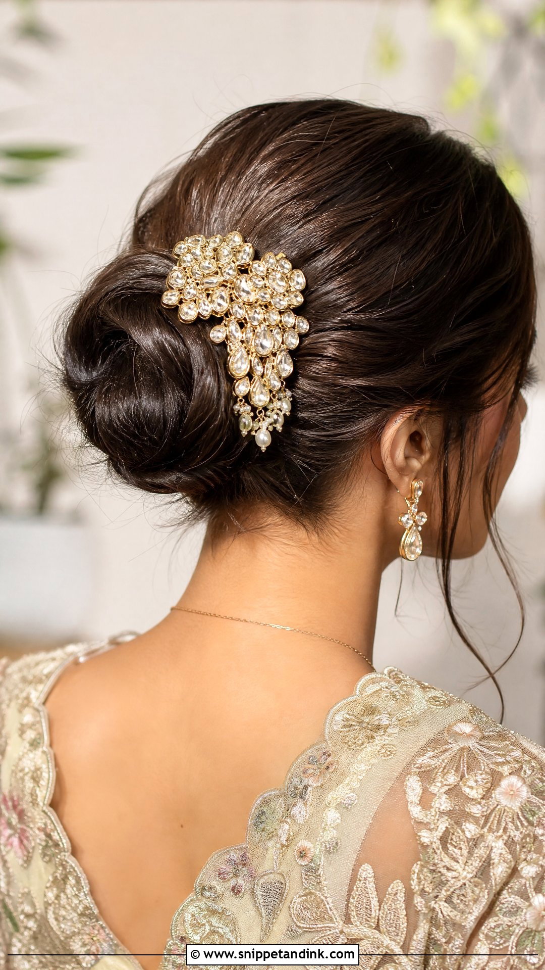 Bun With Statement Hair Clip - Snippet and Ink - 20 Indian Wedding Bun Hairstyle Ideas