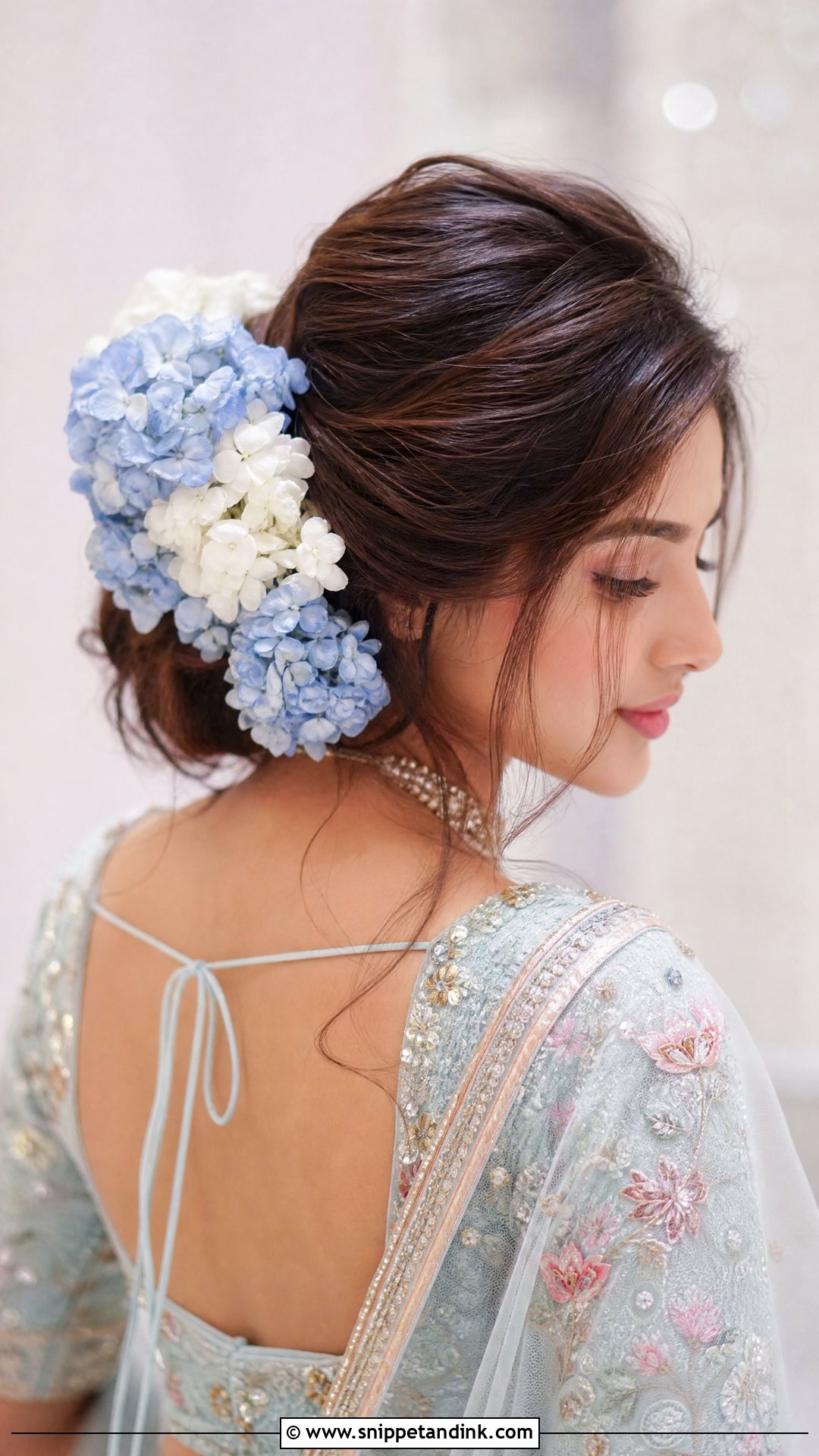Bun with Hydrangea Flowers - Snippet and Ink - 20 Indian Flower Bridal Bun Hairstyles