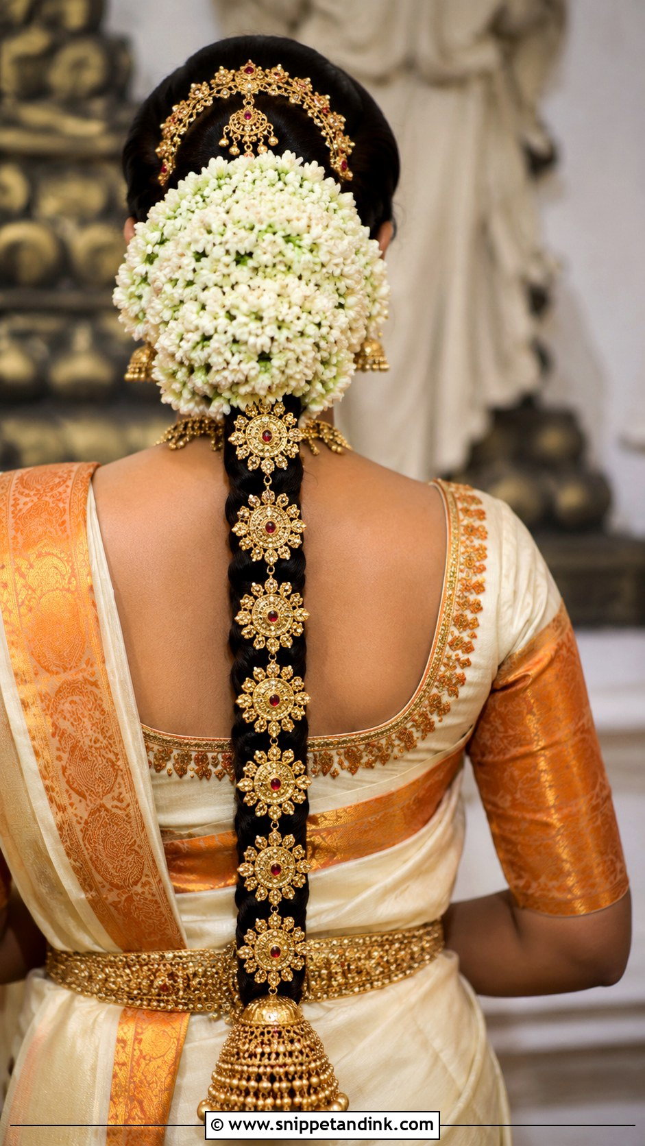Bun with Long Trailing Braid - Snippet and Ink - 25 Indian Wedding Hairstyles for Bride