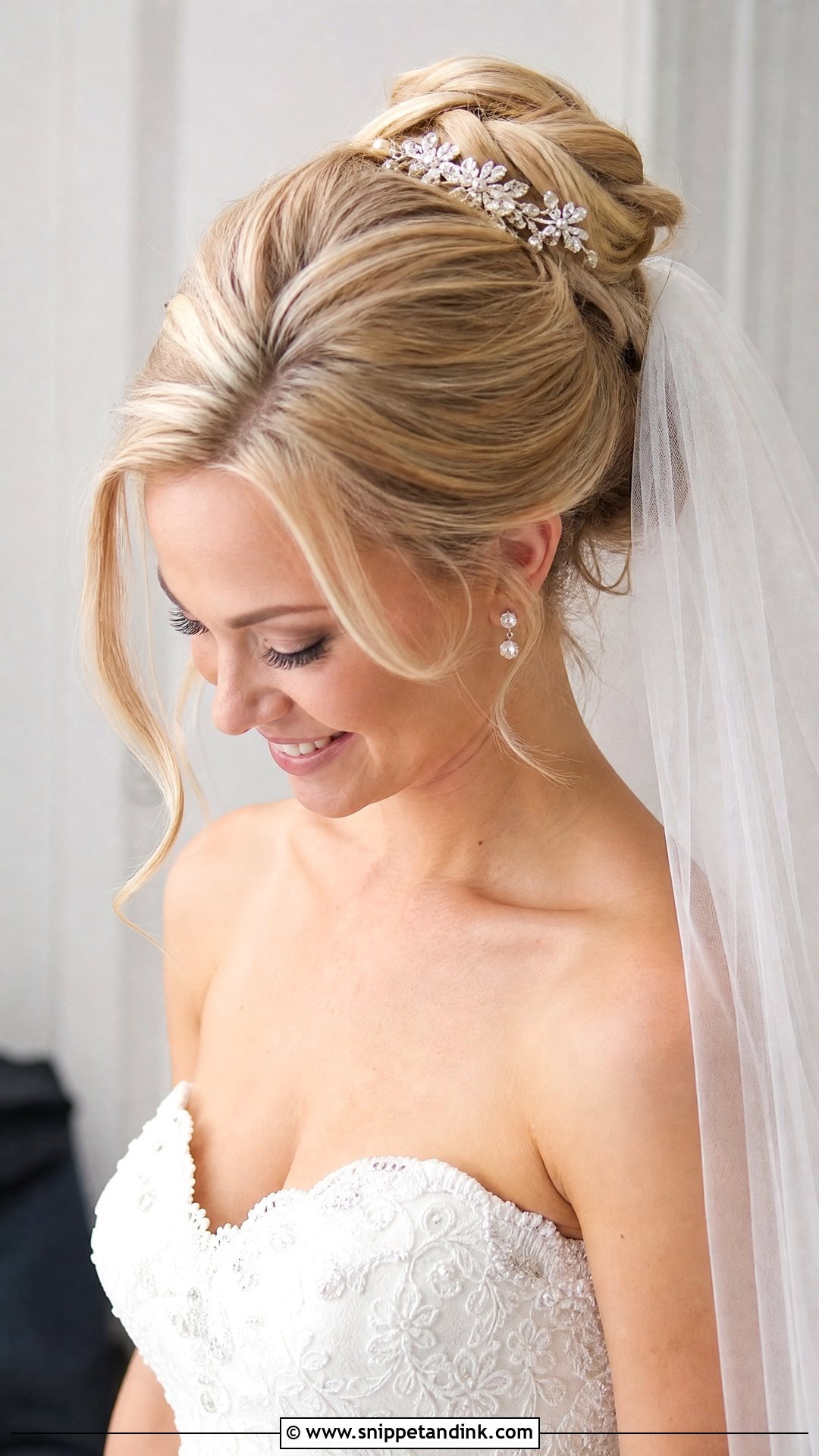 Classic Bridal Updo With Veil - Snippet and Ink - 20 Lauren Kyle Wedding Hair Ideas